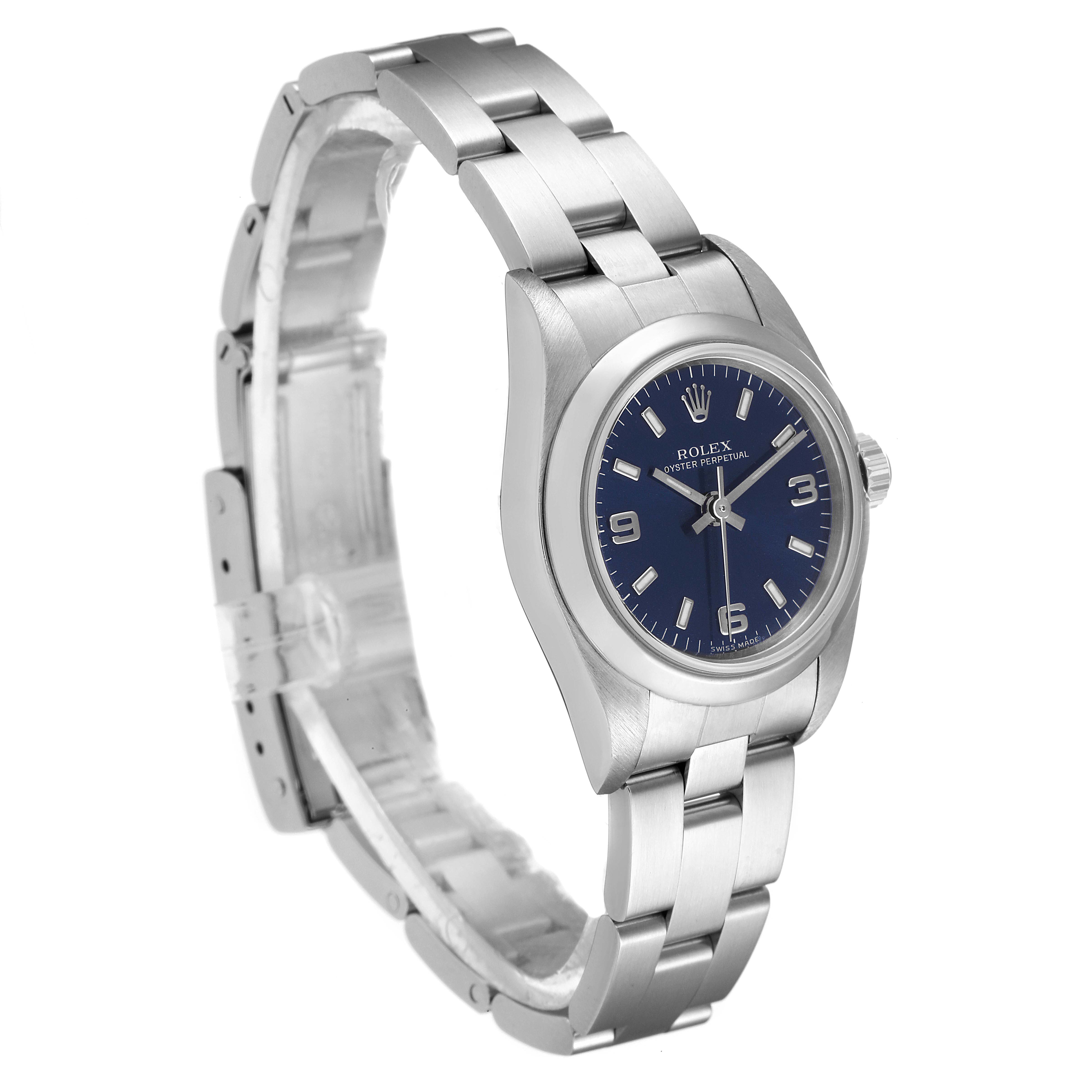 This image shows a Rolex Oyster Perpetual 76080 Women
s Stainless Steel Blue Dial 76080 Women
s Stainless Steel Blue Dial watch at a slight angle, featuring the bezel, dial, crown, and bracelet.