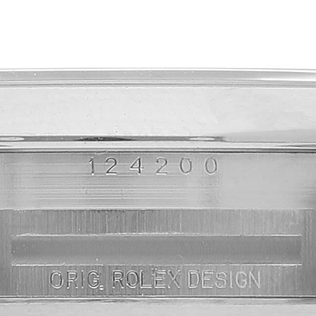 This image shows the side view of a Rolex Oyster Perpetual 124200 Men's Stainless Steel Black Dial 124200 Men's Stainless Steel Black Dial watch, featuring the model number 124200 and "ORIG. ROLEX DESIGN" engraving.