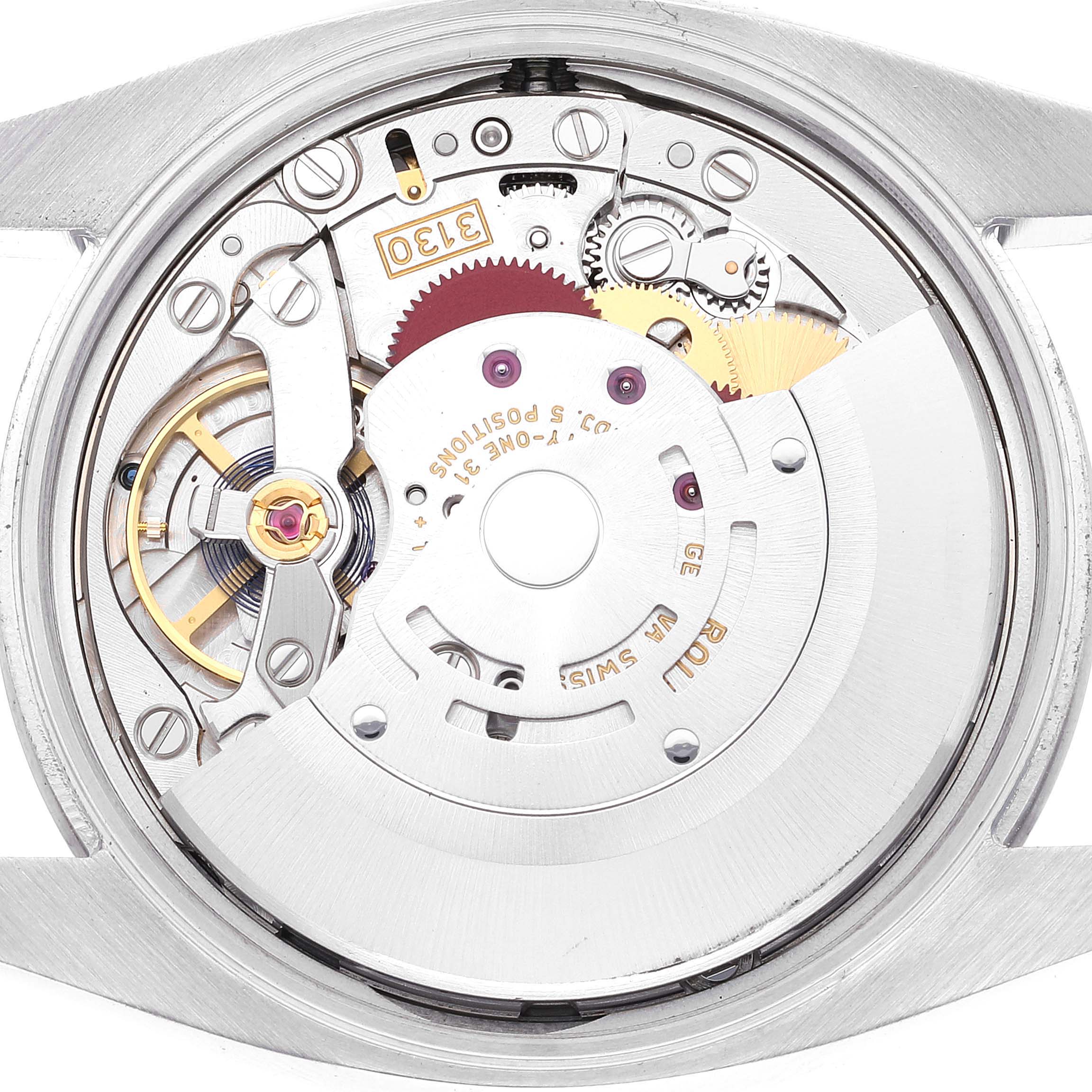 This image shows the internal mechanical movement of a Rolex Oyster Perpetual 114200 Men
s Stainless Steel Green Dial 114200 Men
s Stainless Steel Green Dial watch at a rear angle.