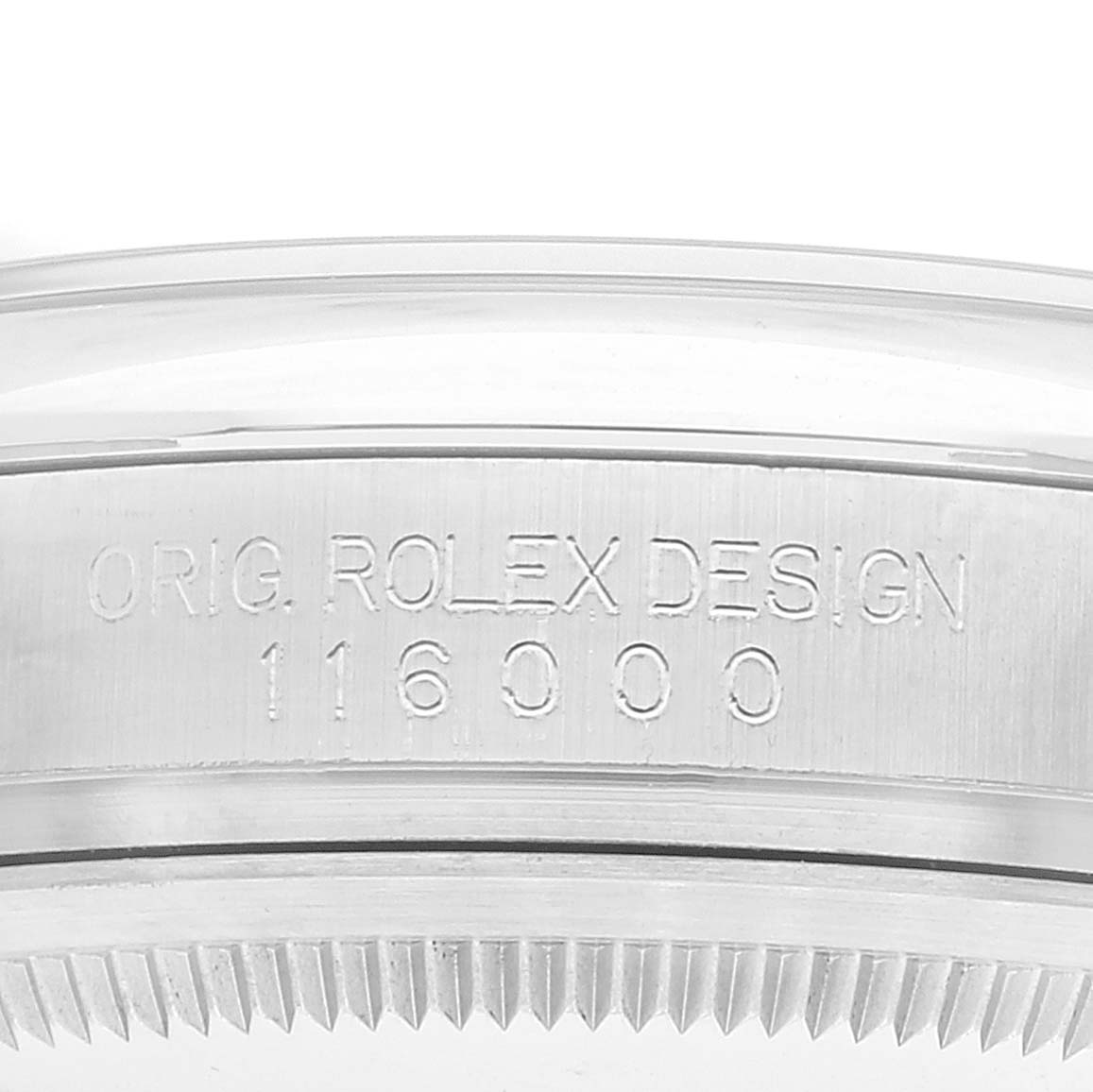 The image shows a macro shot of the case side and bezel of a Rolex Oyster Perpetual 116000 Men's Stainless Steel Grey Dial 116000 Men's Stainless Steel Grey Dial model, highlighting design engravings and model number.