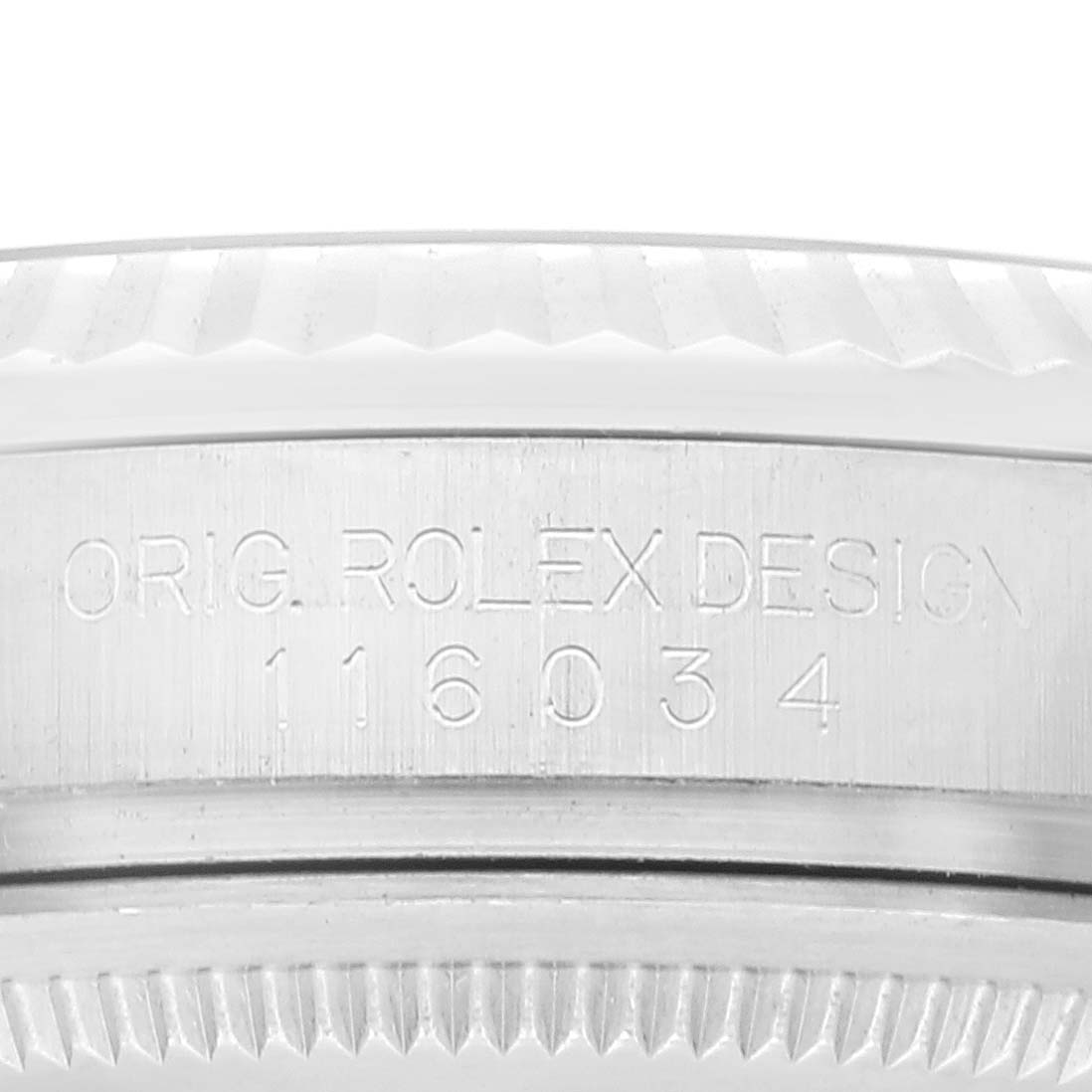 The image shows an angled close-up of the case side of the Rolex Oyster Perpetual 116034 Men's Stainless Steel Black Dial 116034 Men's Stainless Steel Black Dial watch, highlighting the model number 116034.