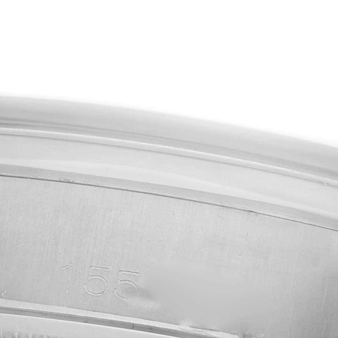 This image shows a close-up of the Rolex Vintage Collection 6694 Men
s Stainless Steel Silver Dial
s watch case edge with a partial serial number.