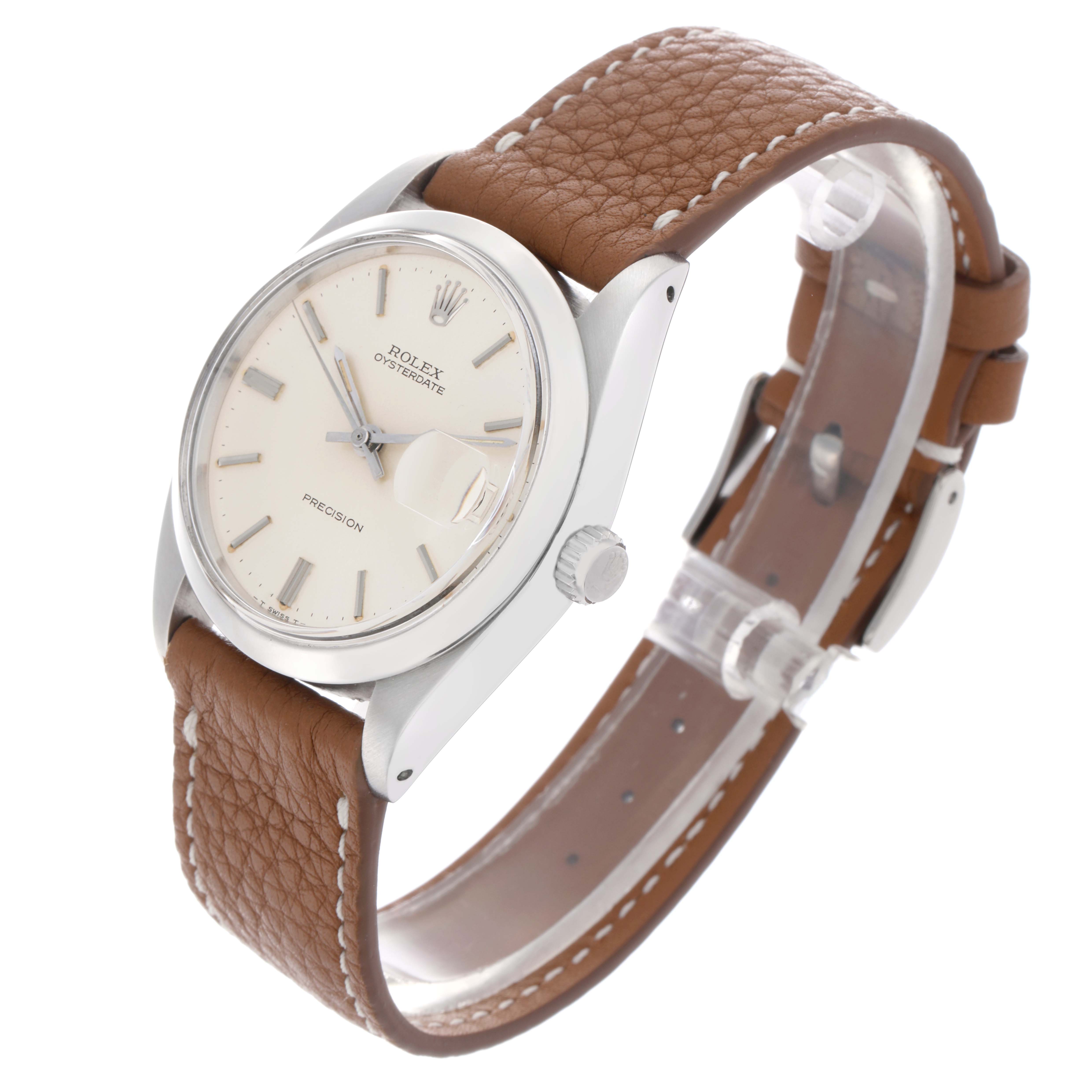 The Rolex Vintage Collection 6694 Men
s Stainless Steel Silver Dial watch is shown at a side angle highlighting the face, crown, and brown leather strap.