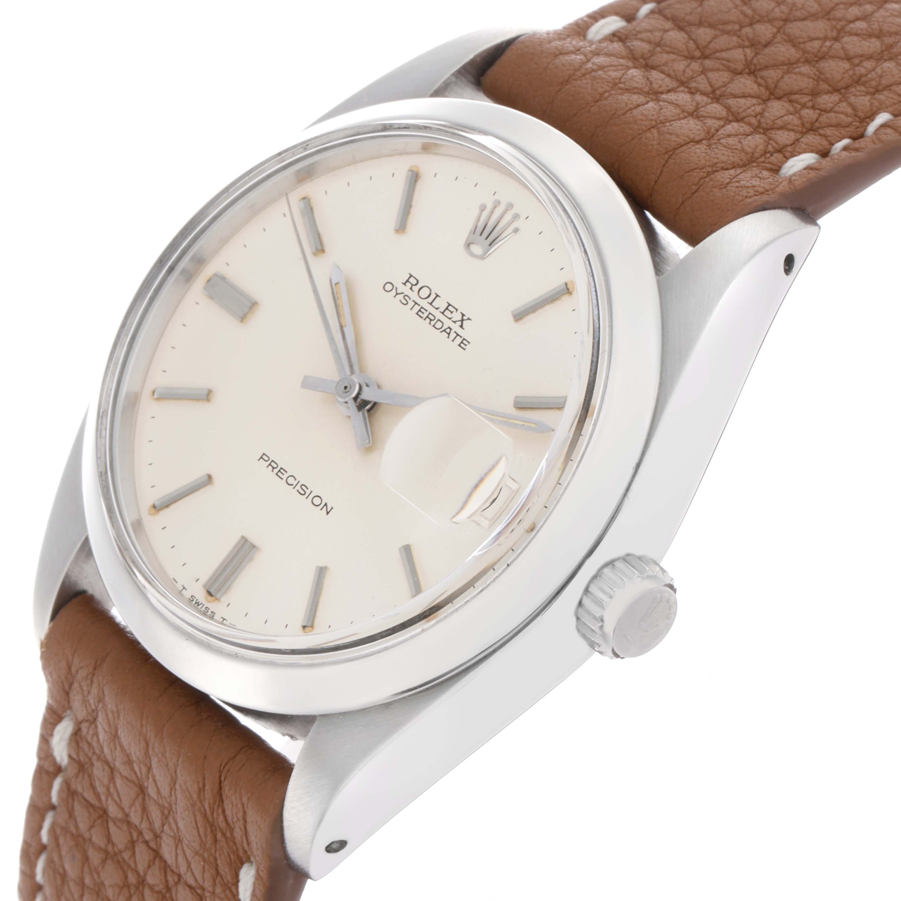 The Rolex Vintage Collection 6694 Men
s Stainless Steel Silver Dial watch is shown at a tilted angle, highlighting the face, crown, and brown leather strap.