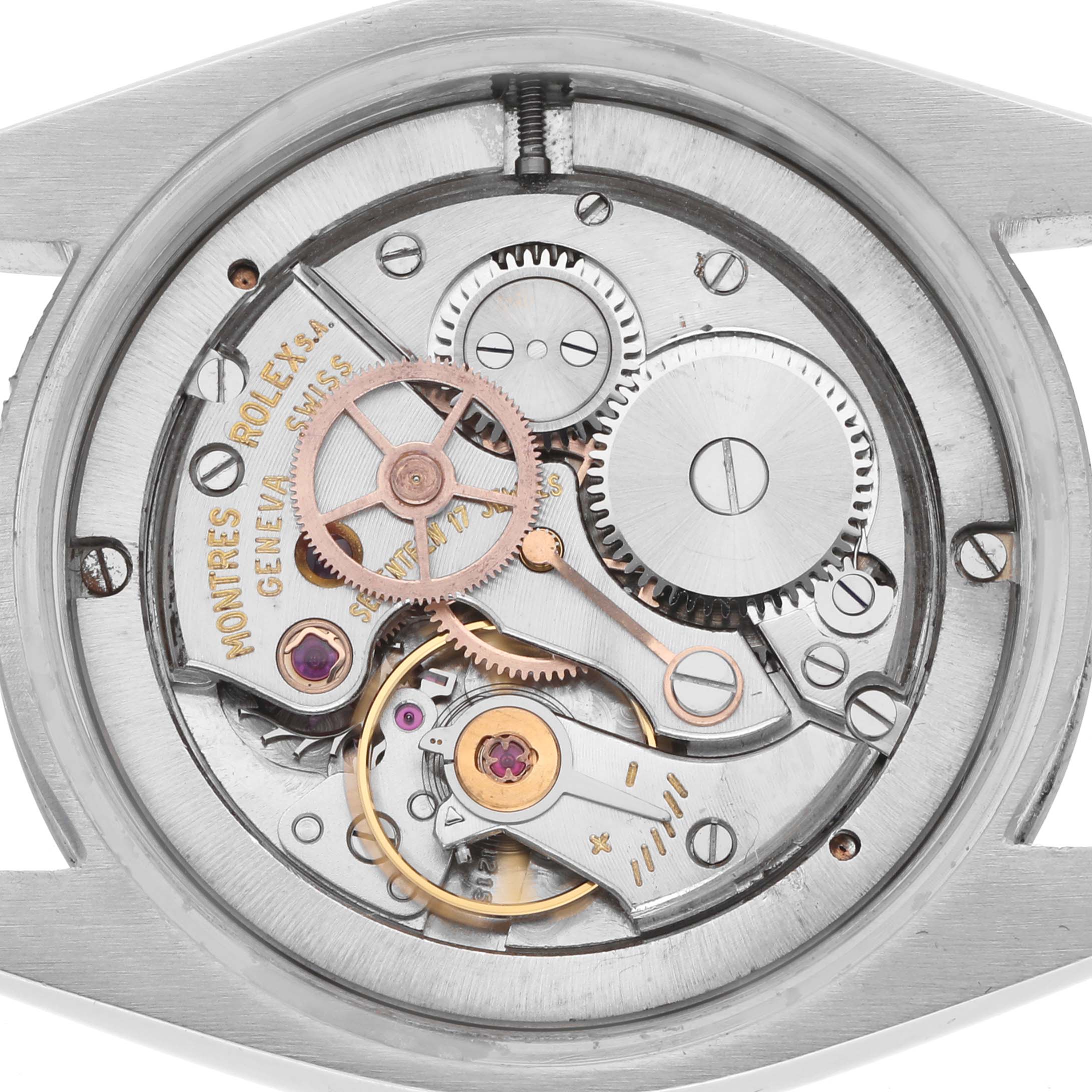 The image shows the internal movement parts of a Rolex Vintage Collection 6694 Men
s Stainless Steel Silver Dial model from the back view.