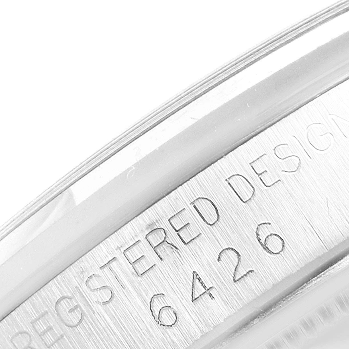 This close-up image shows the side engraving with the registered design number of the Vintage Collection model by Rolex.
