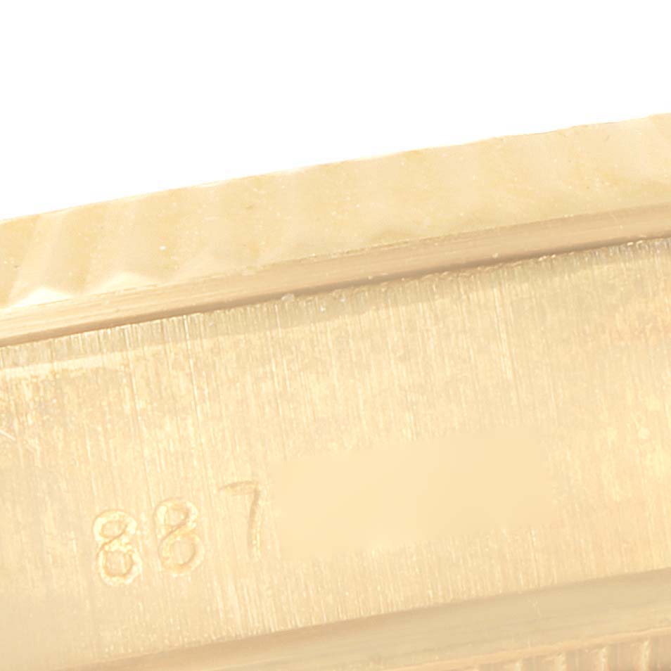 This close-up image shows the side of the case and part of the bezel of a Rolex President 69178 Women's Yellow Gold Champagne Dial 69178 Women's Yellow Gold Champagne Dial model watch.