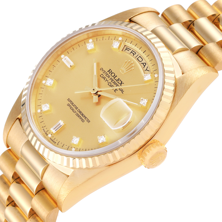 The image shows a close-up angled view of a Rolex President 18238 Men's Yellow Gold Champagne Dial 18238 Men's Yellow Gold Champagne Dial model, featuring the dial, bezel, crown, and part of the bracelet.