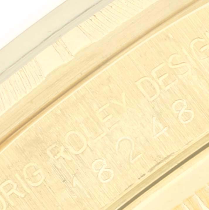 This image shows a close-up of the engraved inner case of a Rolex President 18248 Men's Yellow Gold Champagne Dial 18248 Men's Yellow Gold Champagne Dial watch.