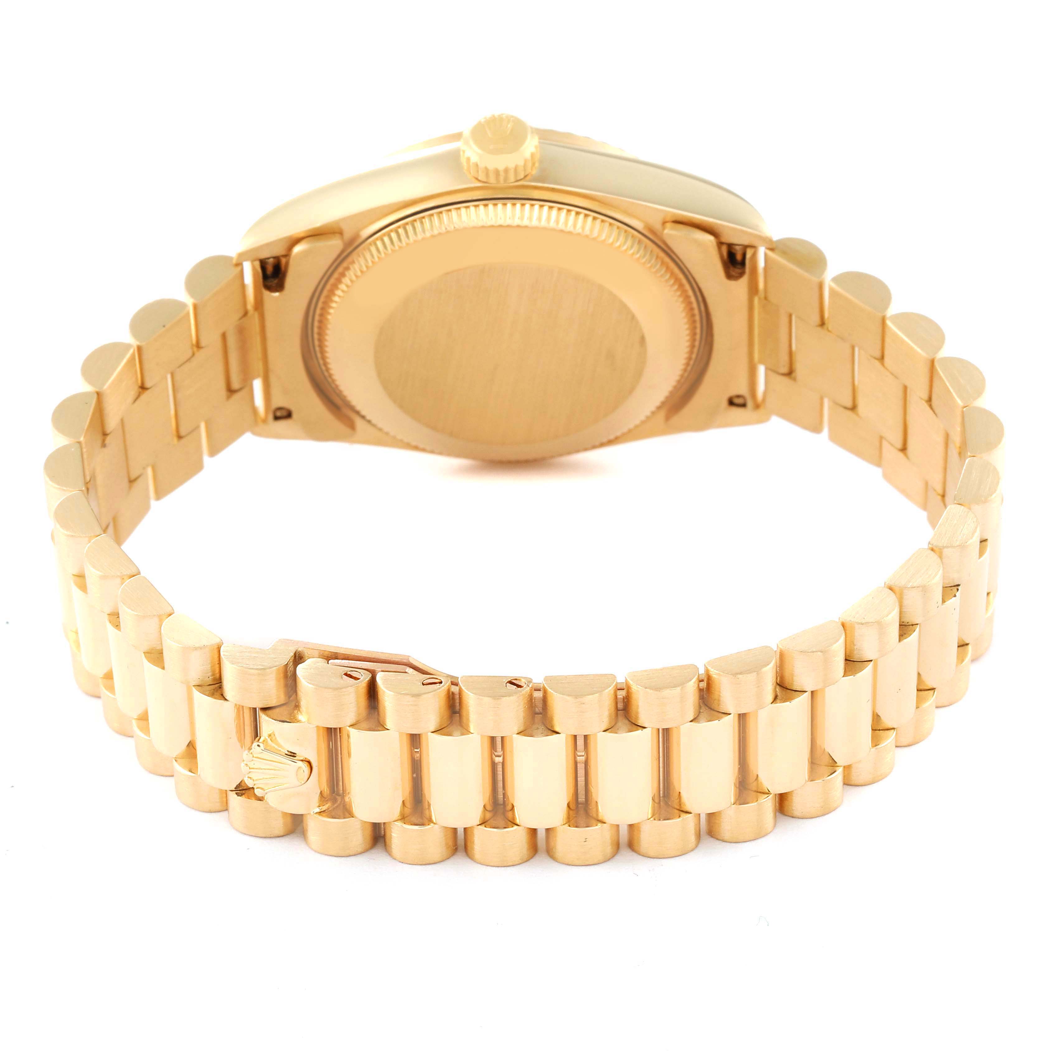 The image shows the back and bracelet of a Rolex President 68278 Women's Yellow Gold Champagne Dial 68278 Women's Yellow Gold Champagne Dial model watch, focusing on the clasp and case back.