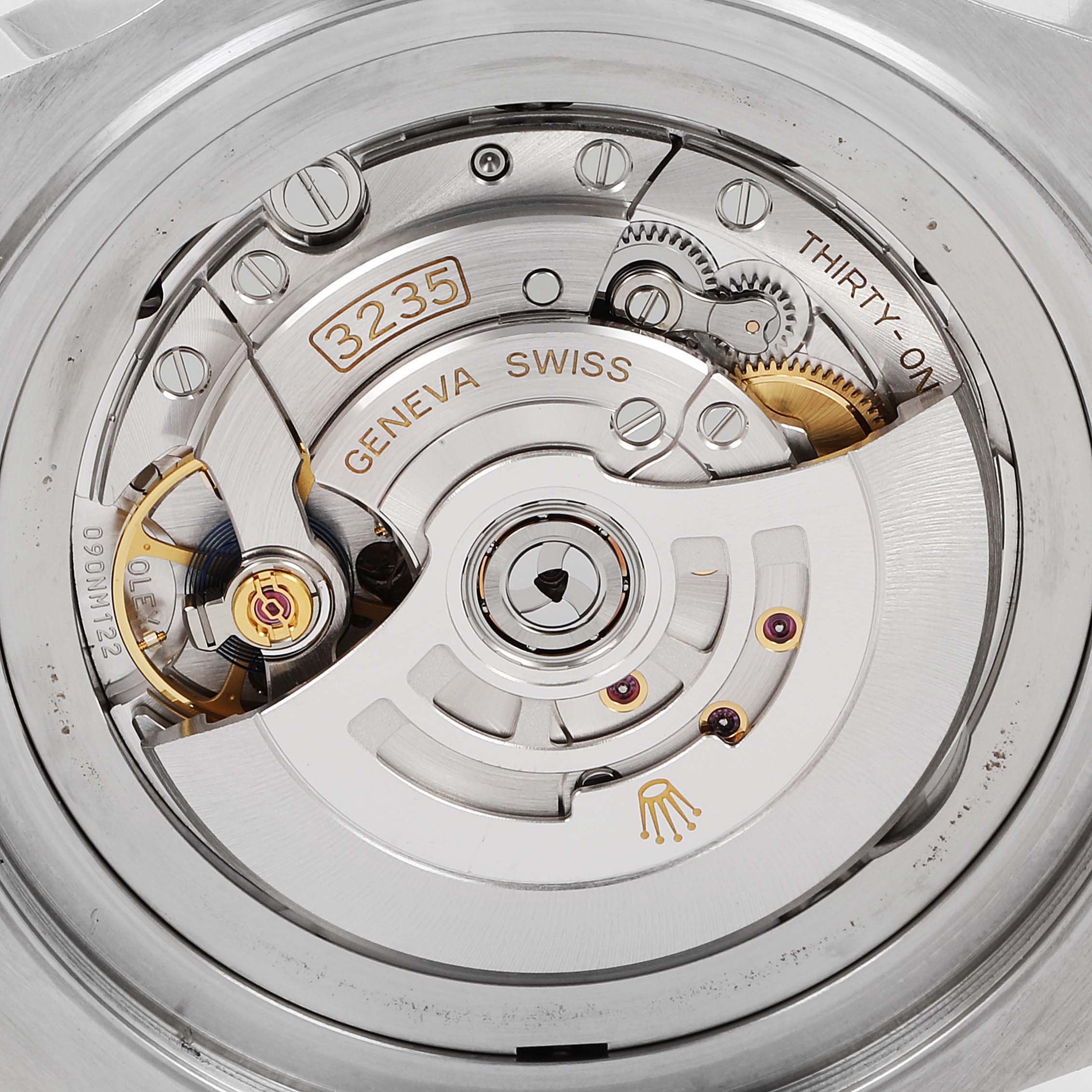 This image shows the intricate internal mechanism and rotor of the Rolex Sea-Dweller 126660 Men's Stainless Steel Blue Dial 126660 Men's Stainless Steel Blue Dial model at a close-up angle.