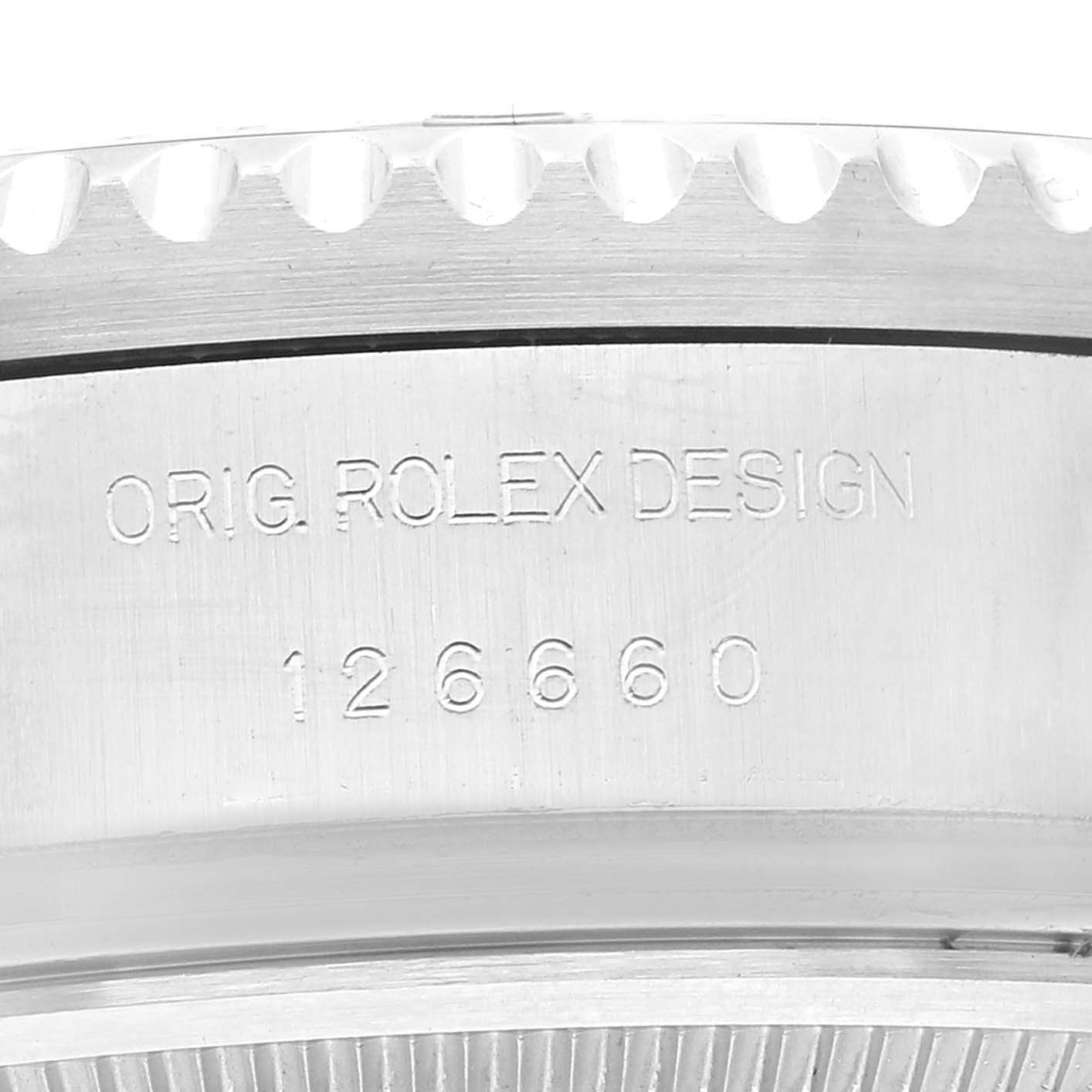 This image shows the side view of the case with the serial number and "ORIG. ROLEX DESIGN" engraving on a Rolex Sea-Dweller 126660 Men
s Stainless Steel Blue Dial 126660 Men
s Stainless Steel Blue Dial watch.