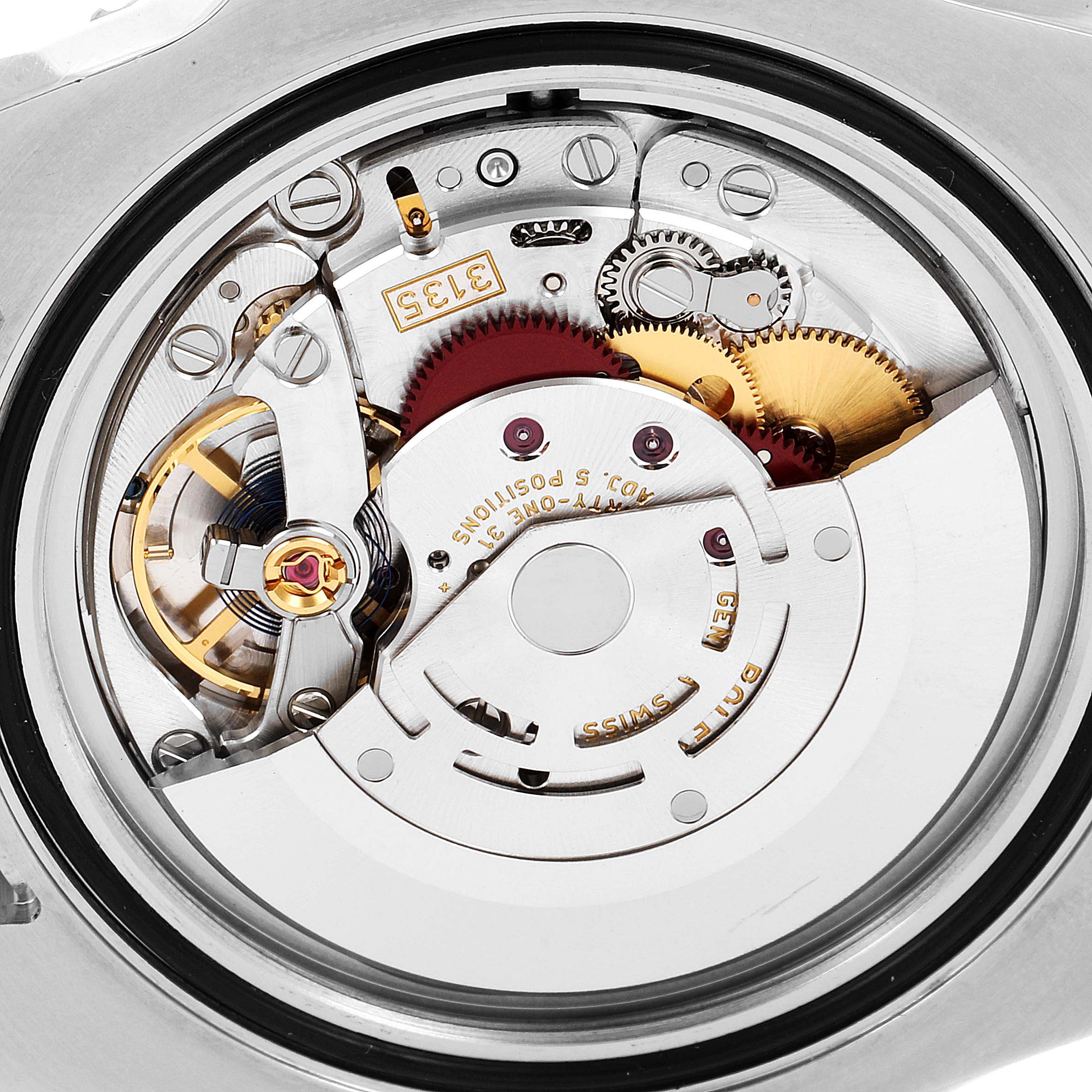 This image shows the internal movement mechanism of the Rolex Submariner 116610 Men's Stainless Steel Black Dial 116610 Men's Stainless Steel Black Dial watch from a top-down angle.