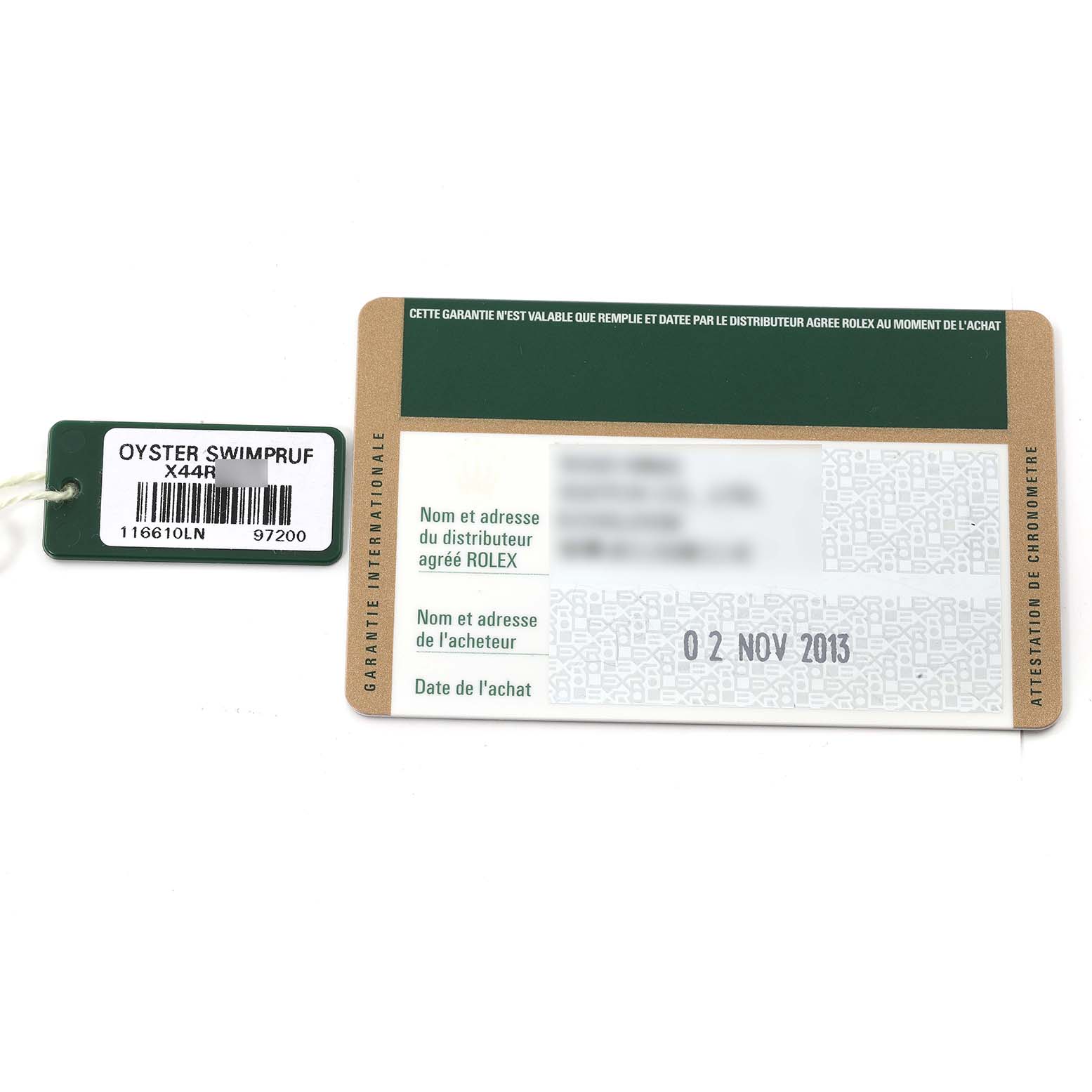 This image shows the warranty card and hang tag for a Rolex Submariner 116610 Men
s Stainless Steel Black Dial 116610 Men
s Stainless Steel Black Dial model.