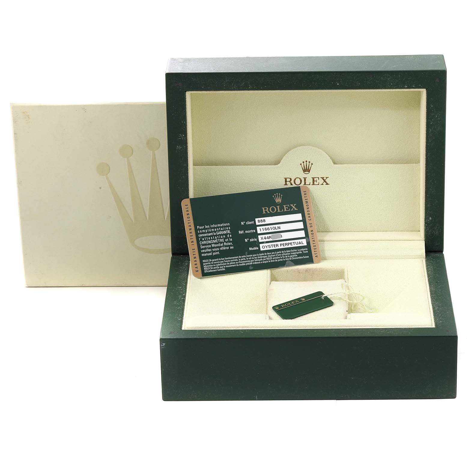 This image shows an open Rolex Submariner 116610 Men
s Stainless Steel Black Dial 116610 Men
s Stainless Steel Black Dial watch box with a warranty card and a green tag inside.
