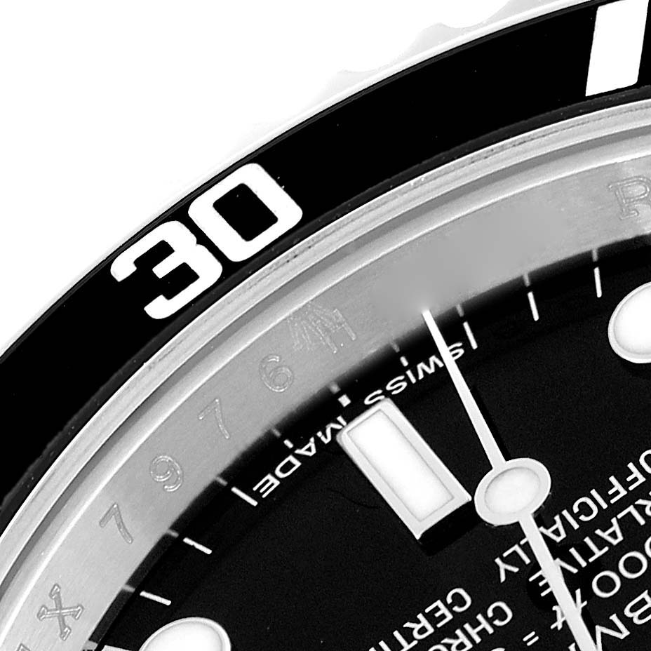 This image shows a close-up angle of the bezel and dial of a Rolex Submariner 14060 Men
s Stainless Steel Black Dial 14060 Men
s Stainless Steel Black Dial watch, highlighting the 30-minute marker.