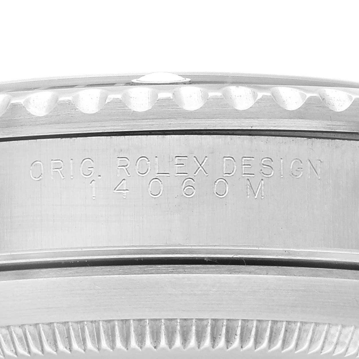 The image shows a close-up of the side of a Rolex Submariner 14060 Men
s Stainless Steel Black Dial 14060 Men
s Stainless Steel Black Dial case with the model number 14060M engraved.