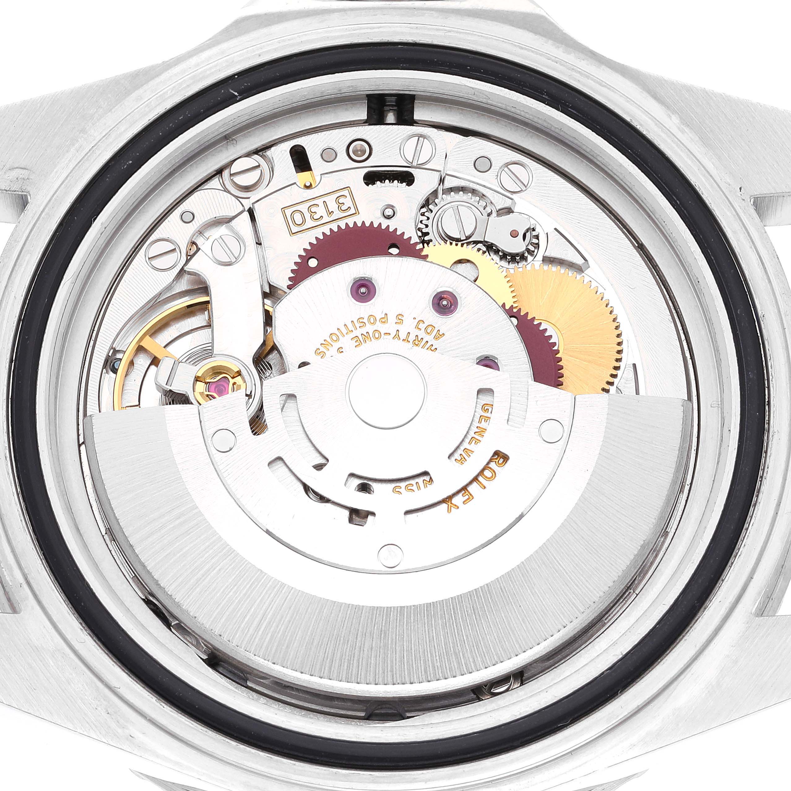 The image shows the back view of a Rolex Submariner 14060 Men
s Stainless Steel Black Dial 14060 Men
s Stainless Steel Black Dial, detailing its intricate inner mechanical movement.