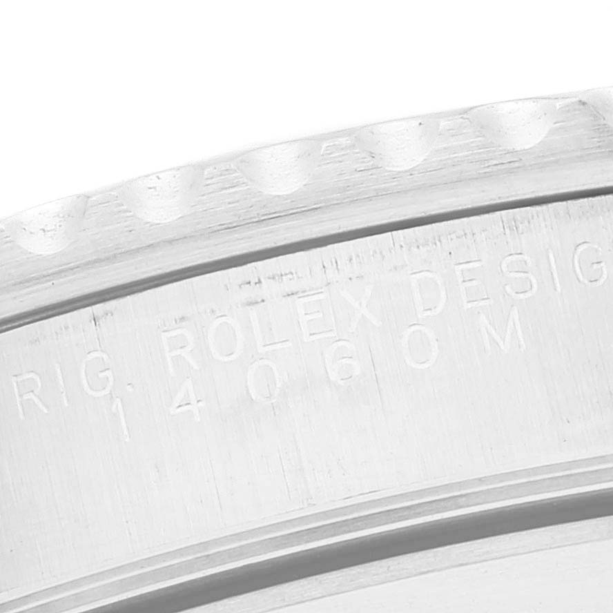 The image shows a close-up of the engraved case back of a Rolex Submariner 14060 Men's Stainless Steel Black Dial 14060 Men's Stainless Steel Black Dial watch.