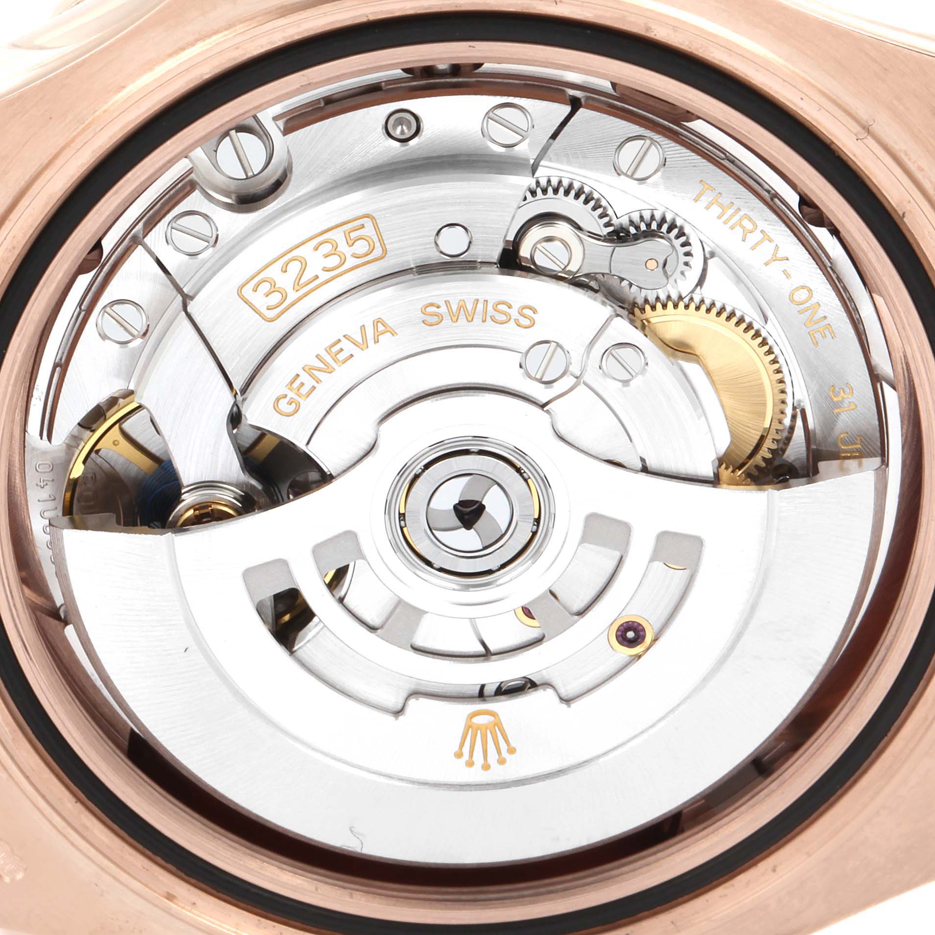 The image shows the internal mechanism of a Rolex Yacht-Master 126655 Men's Rose Gold Black Dial 126655 Men's Rose Gold Black Dial watch, including gears and the engraved caliber number 3235.