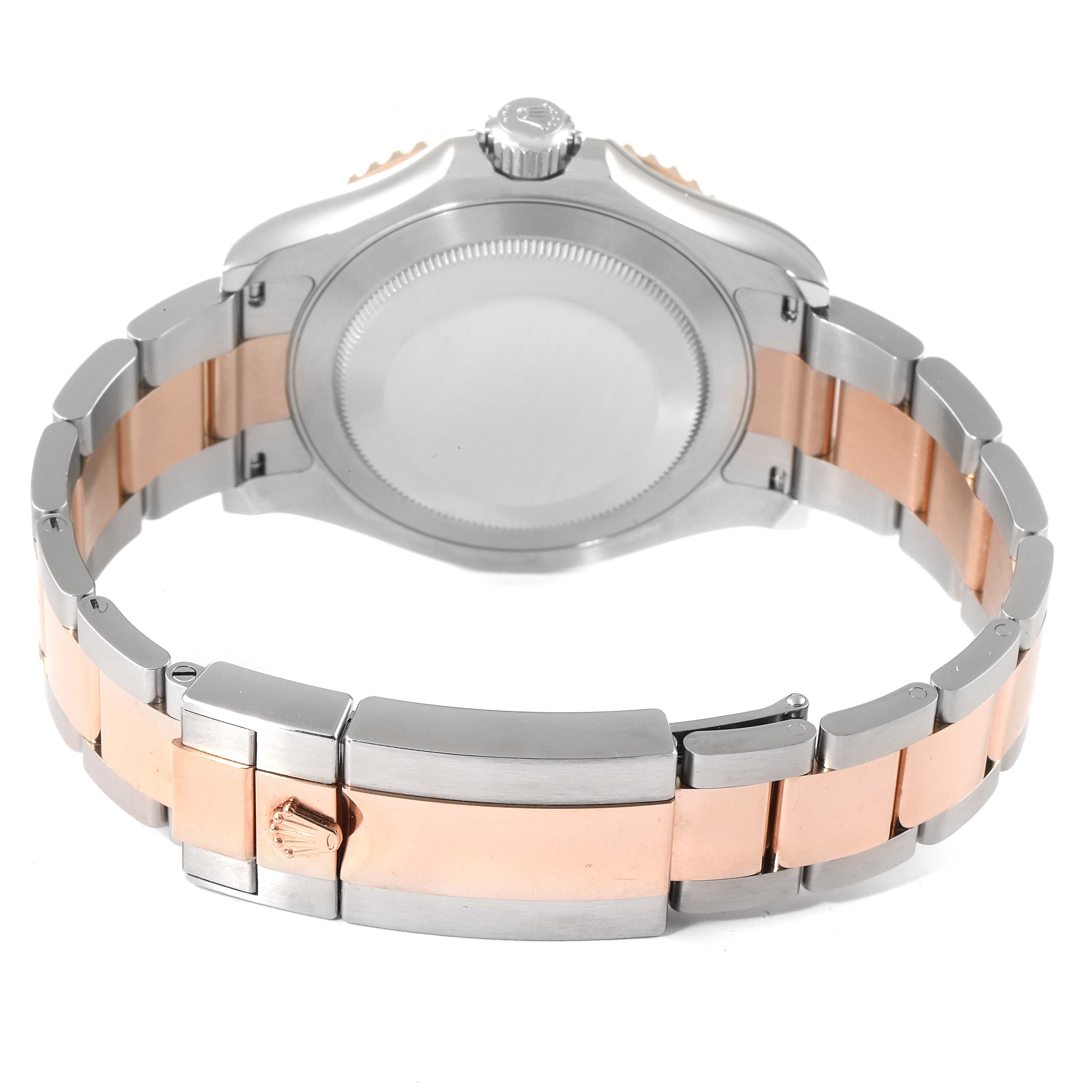 The image shows the back and bracelet of a Rolex Yacht-Master 126621 Men's Steel and Gold (two tone) Black Dial 126621 Men's Steel and Gold (two tone) Black Dial watch at a slight upward angle.