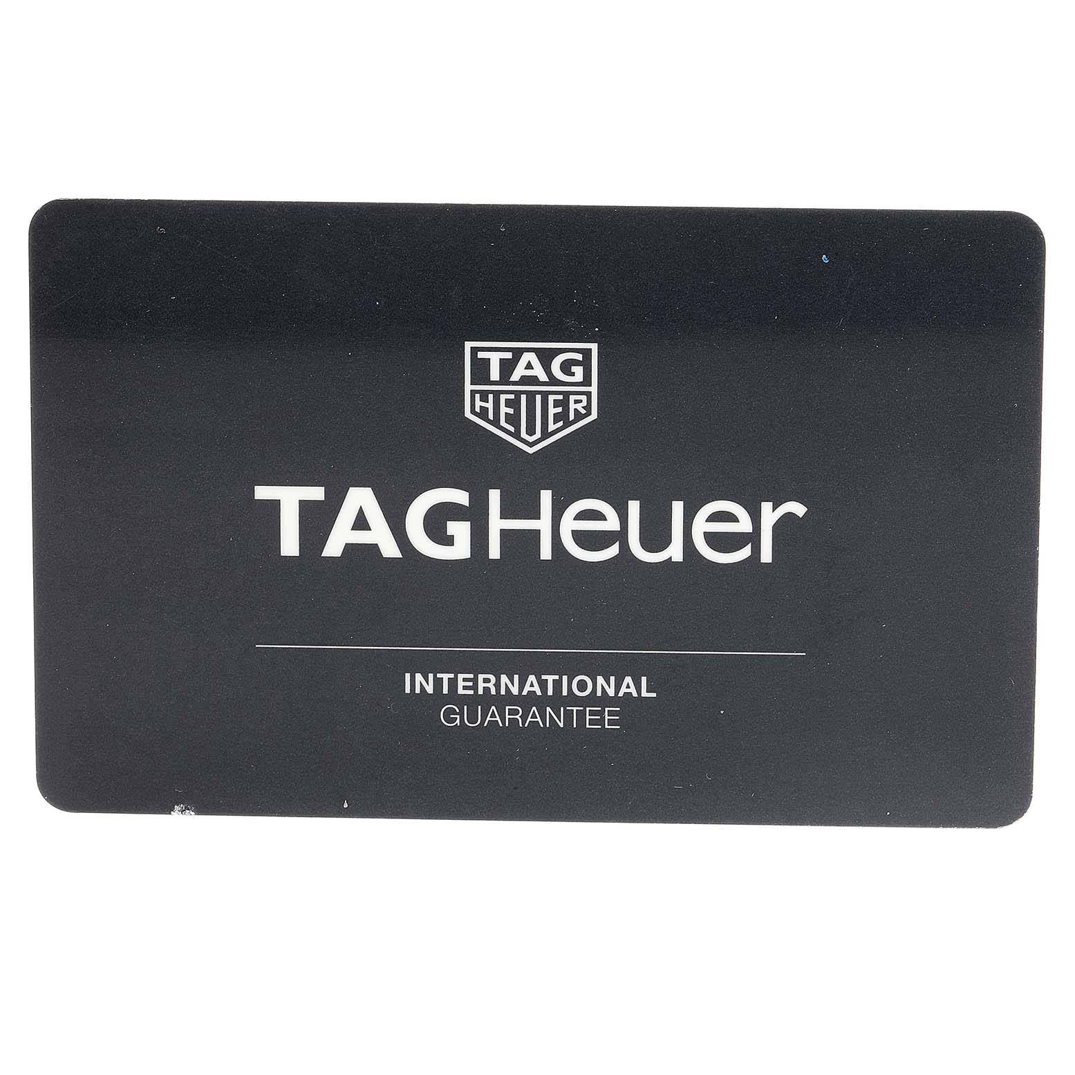 The image shows the international guarantee card for the Carrera model by TAG Heuer.