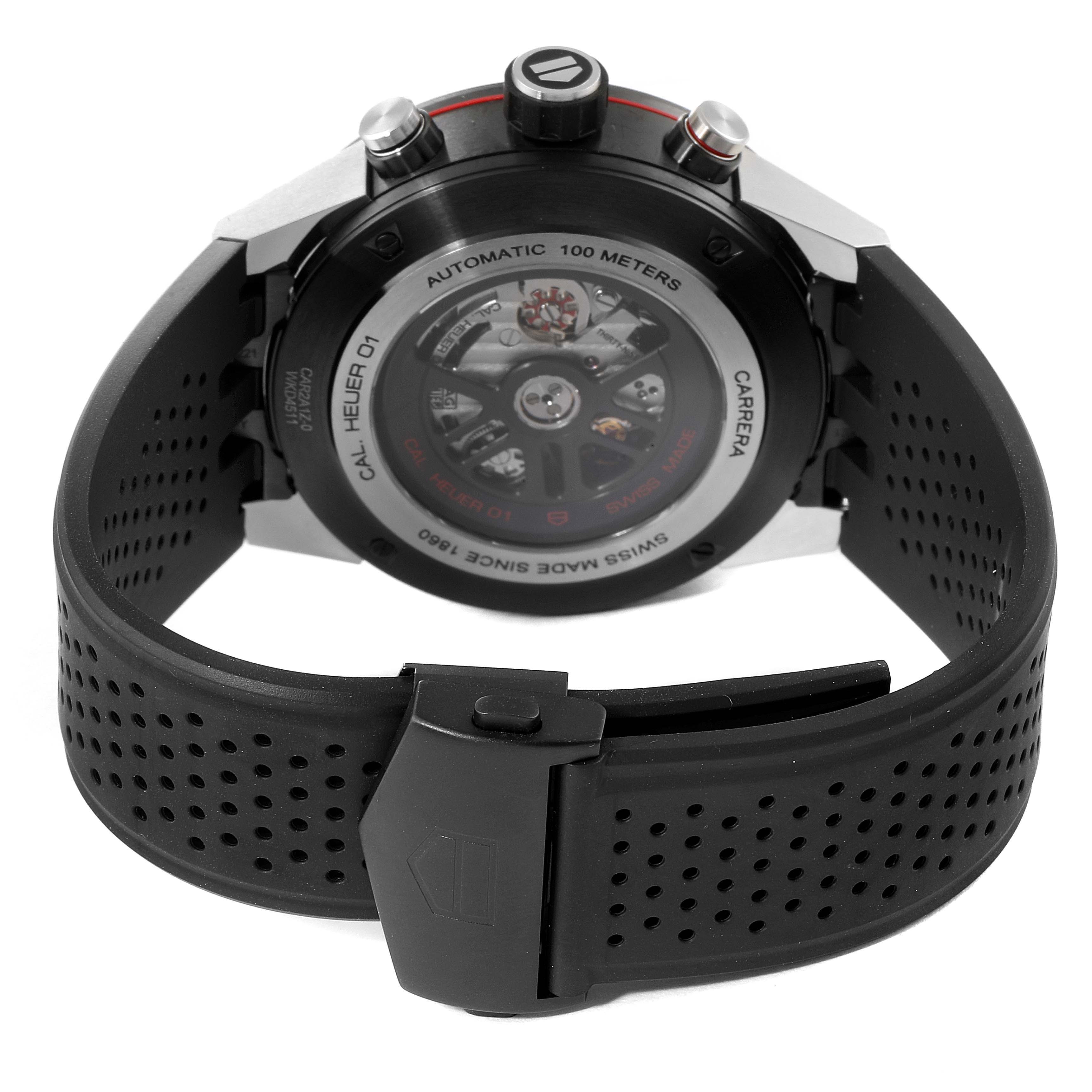 The image shows the back view of a Tag Heuer Carrera CAR2A1Z.FT6044 Men
s Stainless Steel Black Dial CAR2A1Z.FT6044 Men
s Stainless Steel Black Dial watch, focusing on the case back and black perforated strap.