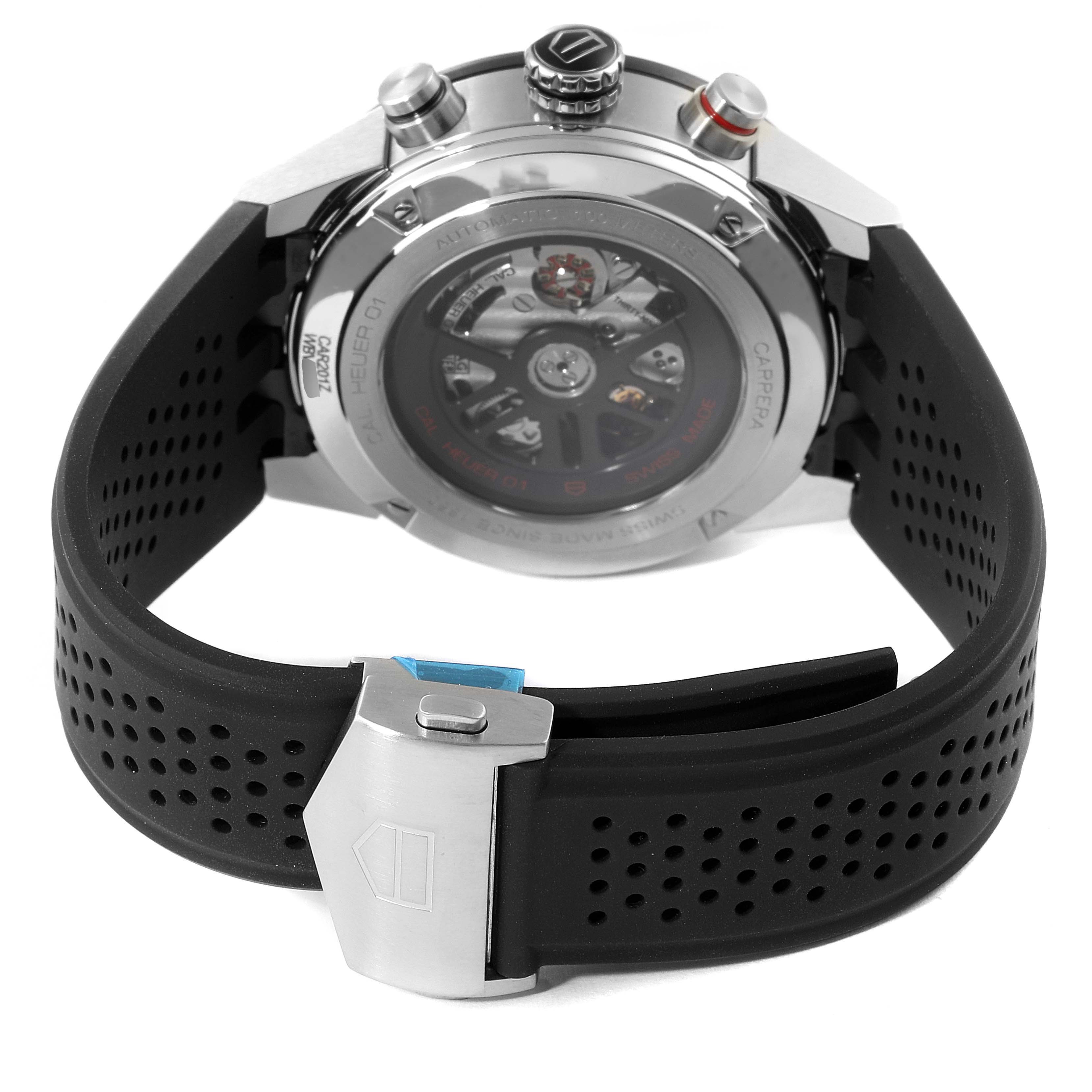 This image shows the back of a Tag Heuer Carrera CAR201Z.BA0714 Men
s Stainless Steel Black Dial CAR201Z.BA0714 Men
s Stainless Steel Black Dial watch, highlighting its transparent case back and black perforated strap.