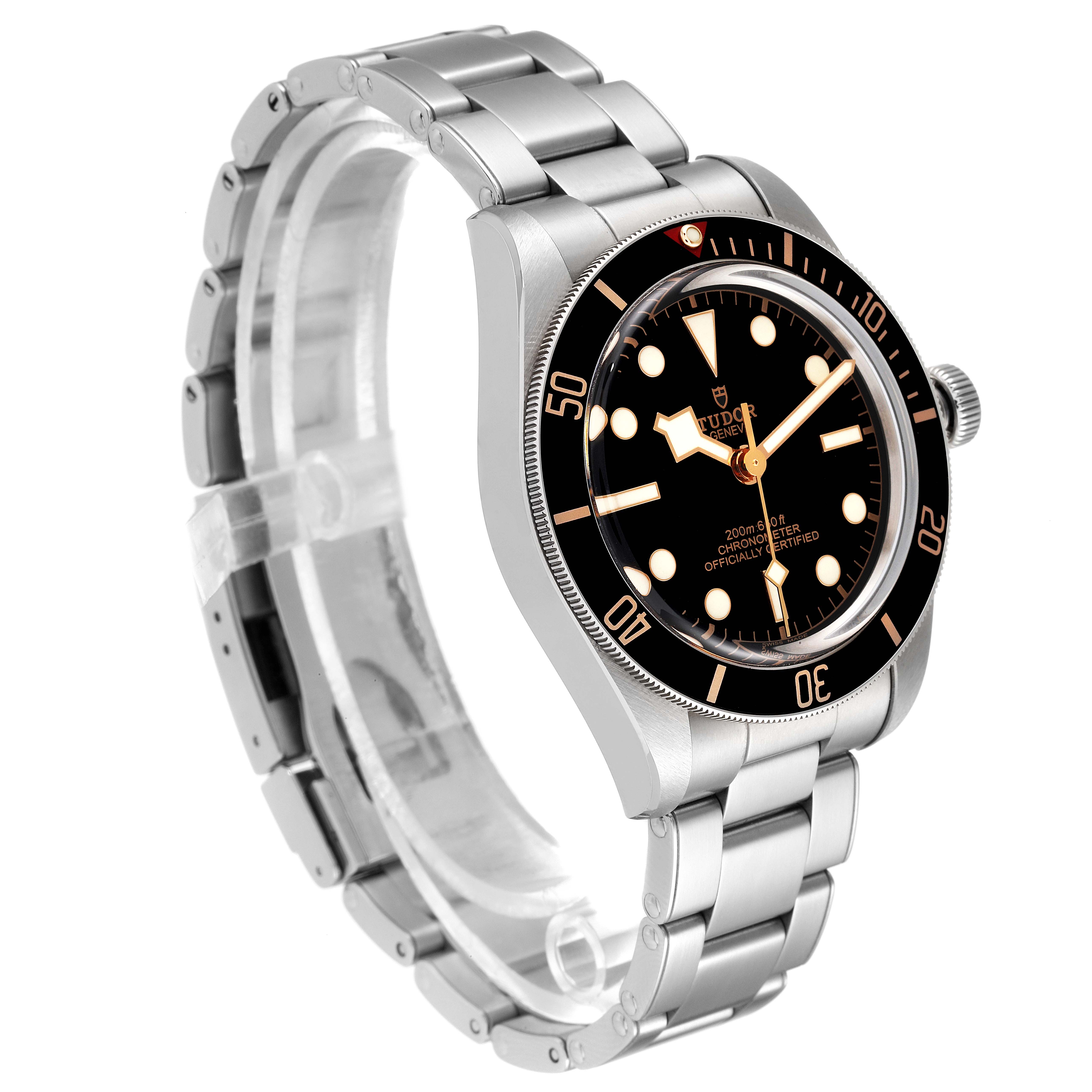 The Tudor Heritage Black Bay 79030N Men's Stainless Steel Black Dial 79030N Men's Stainless Steel Black Dial watch is shown at an angle highlighting the face, bezel, crown, and stainless steel bracelet.