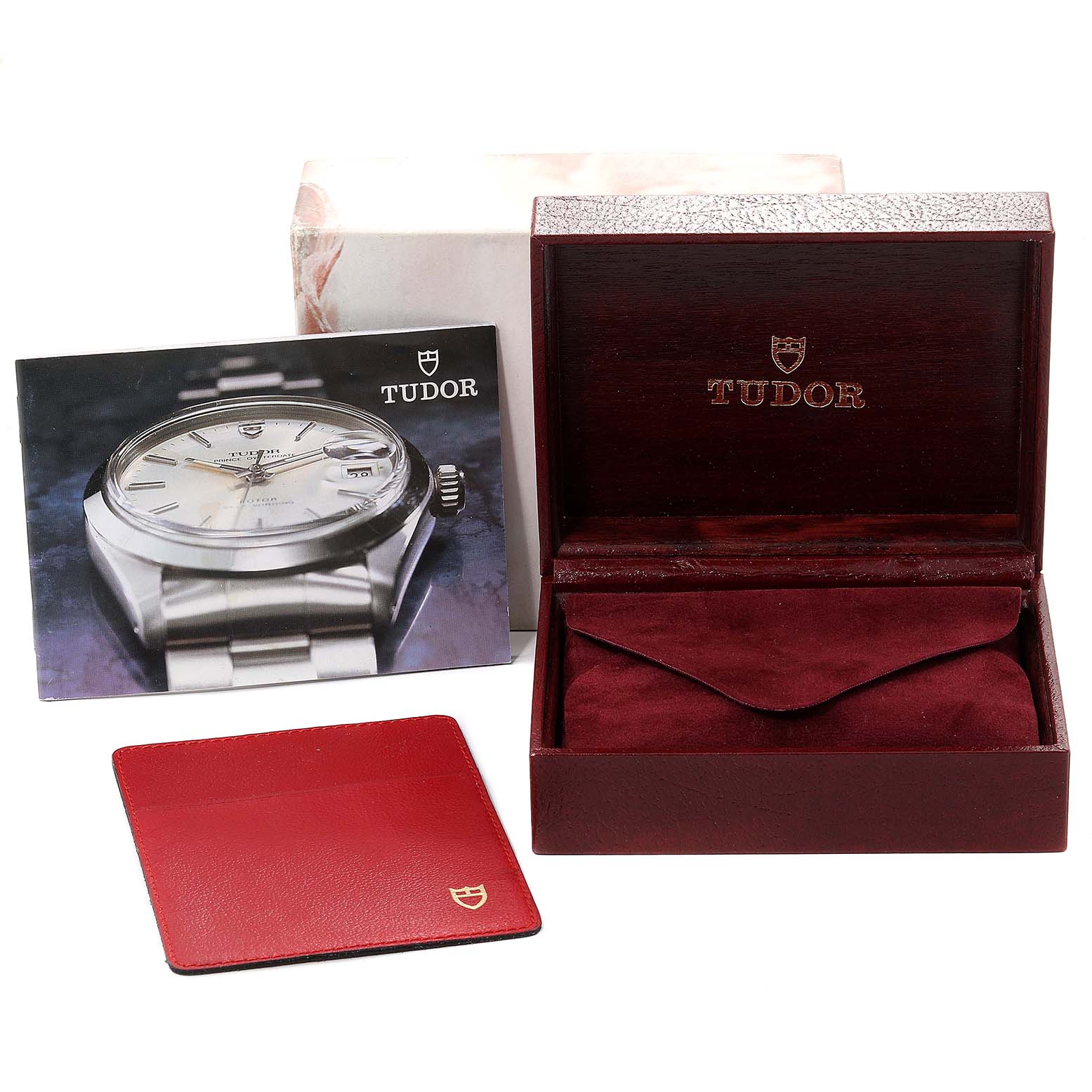 The image shows the Tudor Prince 79280 Men's Stainless Steel Black Dial 79280 Men's Stainless Steel Black Dial watch model with its accessories, including a display box, a manual, and a cardholder.