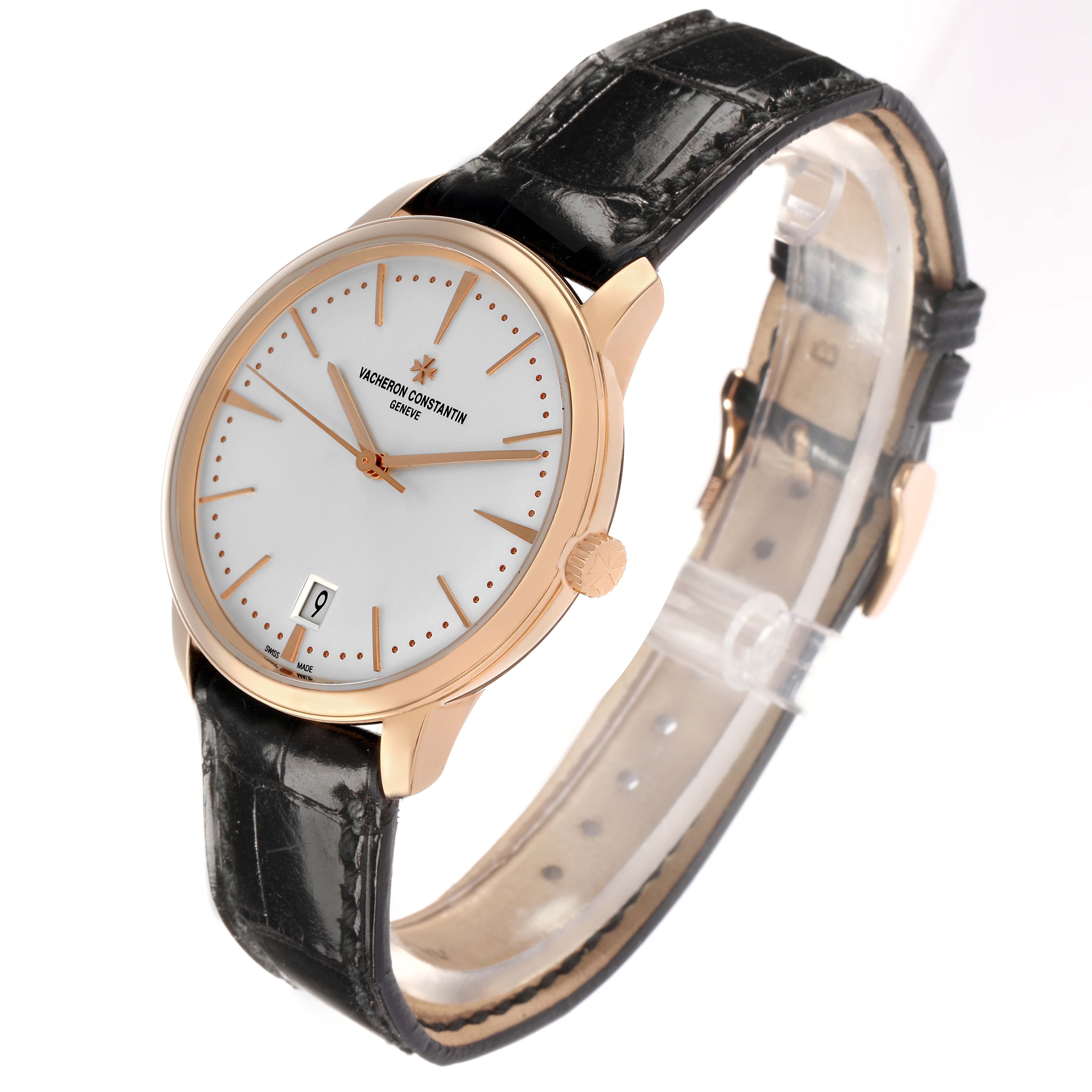 The Patrimony watch by Vacheron Constantin is shown from a three-quarter angle, highlighting the dial, bezel, strap, and crown.