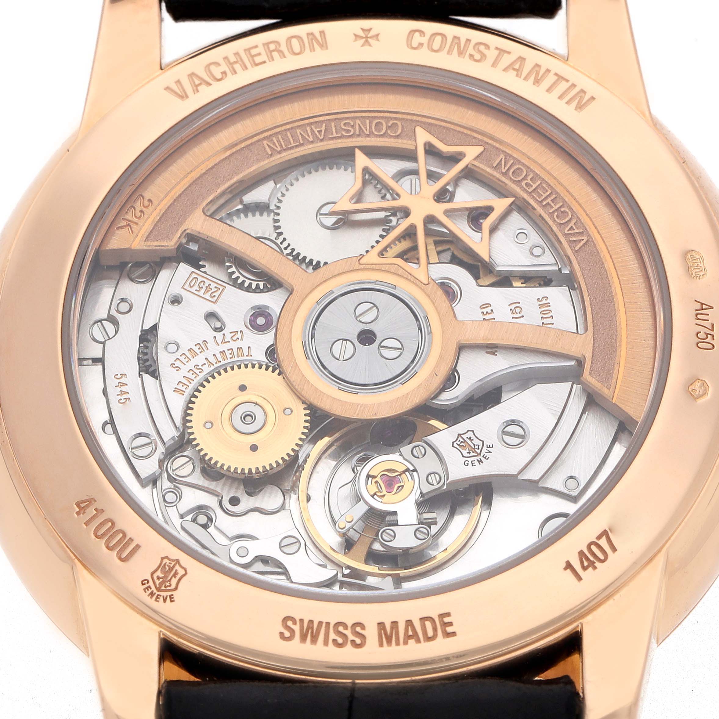 The image shows the back of a Vacheron Constantin Patrimony 4100U Men
s Rose Gold Silver Dial watch, displaying its intricate mechanical movement.