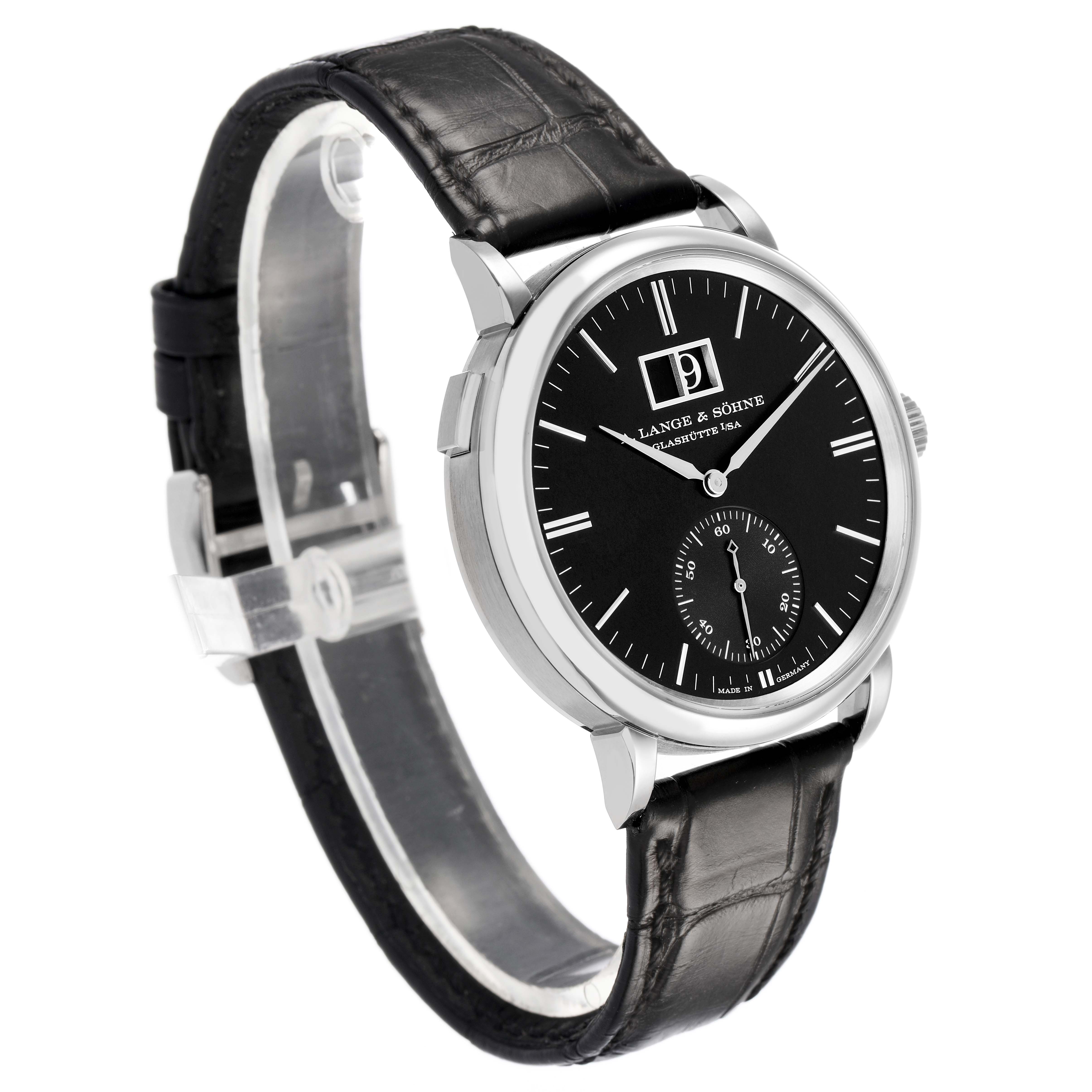 The A. Lange & Sohne Saxonia 381.029 / LSLS3813AD Men's White Gold Black Dial watch is shown at a three-quarter angle, featuring the black dial, hands, date, and leather strap.