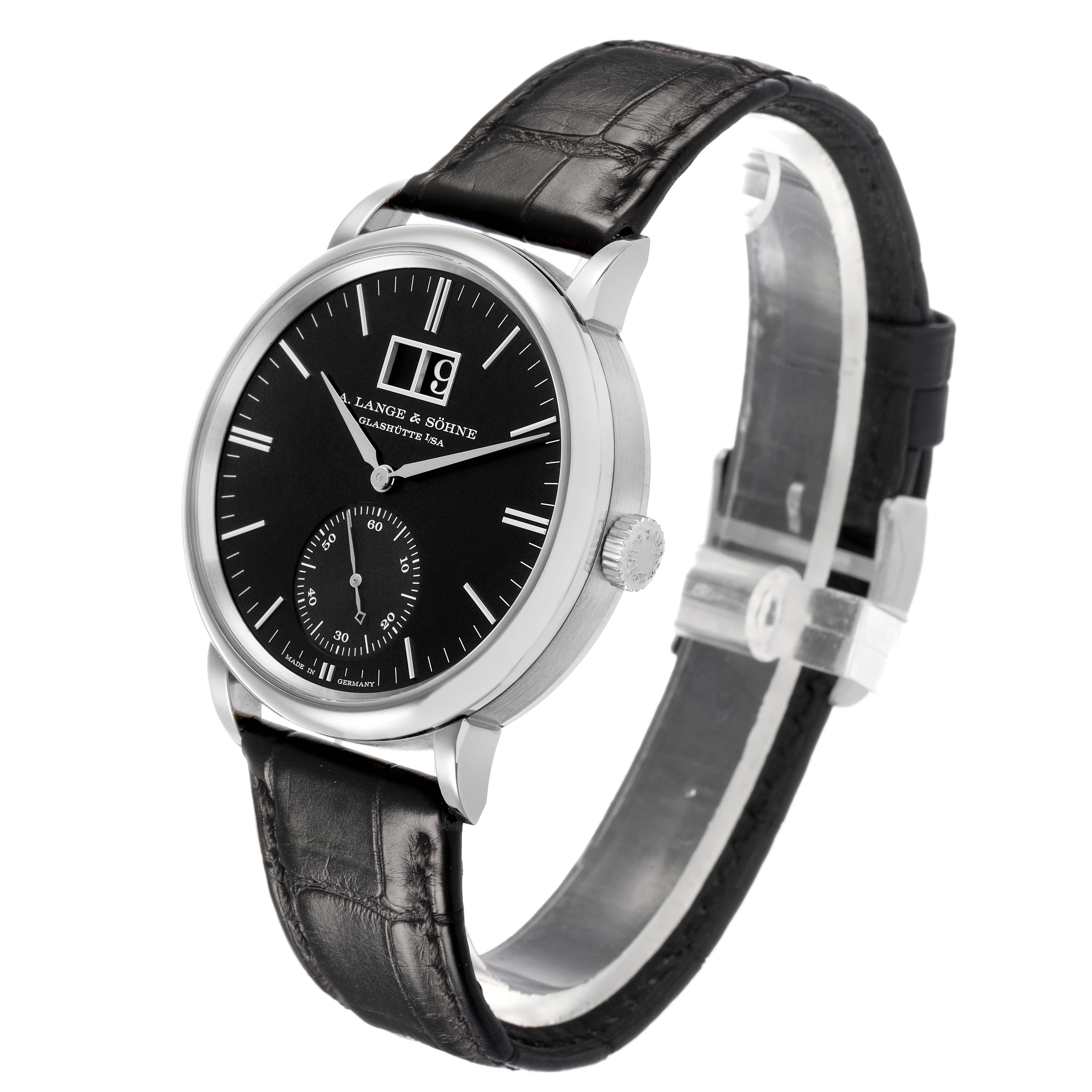 The A. Lange & Sohne Saxonia 381.029 / LSLS3813AD Men's White Gold Black Dial watch is shown at a three-quarter angle, displaying the face, lugs, case, crown, and black leather strap.