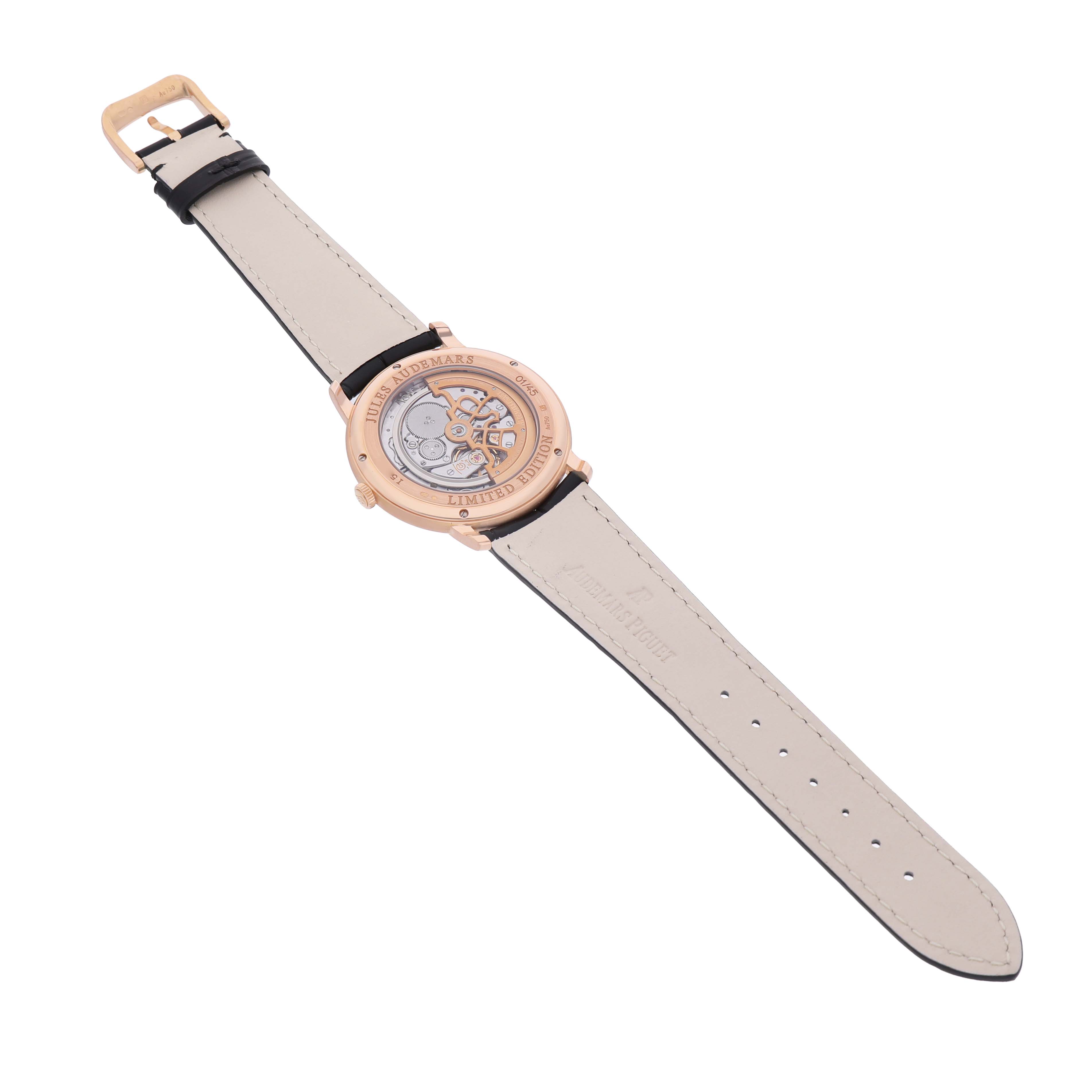 The image shows the back of the Audemars Piguet Jules 15184OR.OO.A102CR.01 Men's Rose Gold Black Dial model, highlighting its open case back and movement details.
