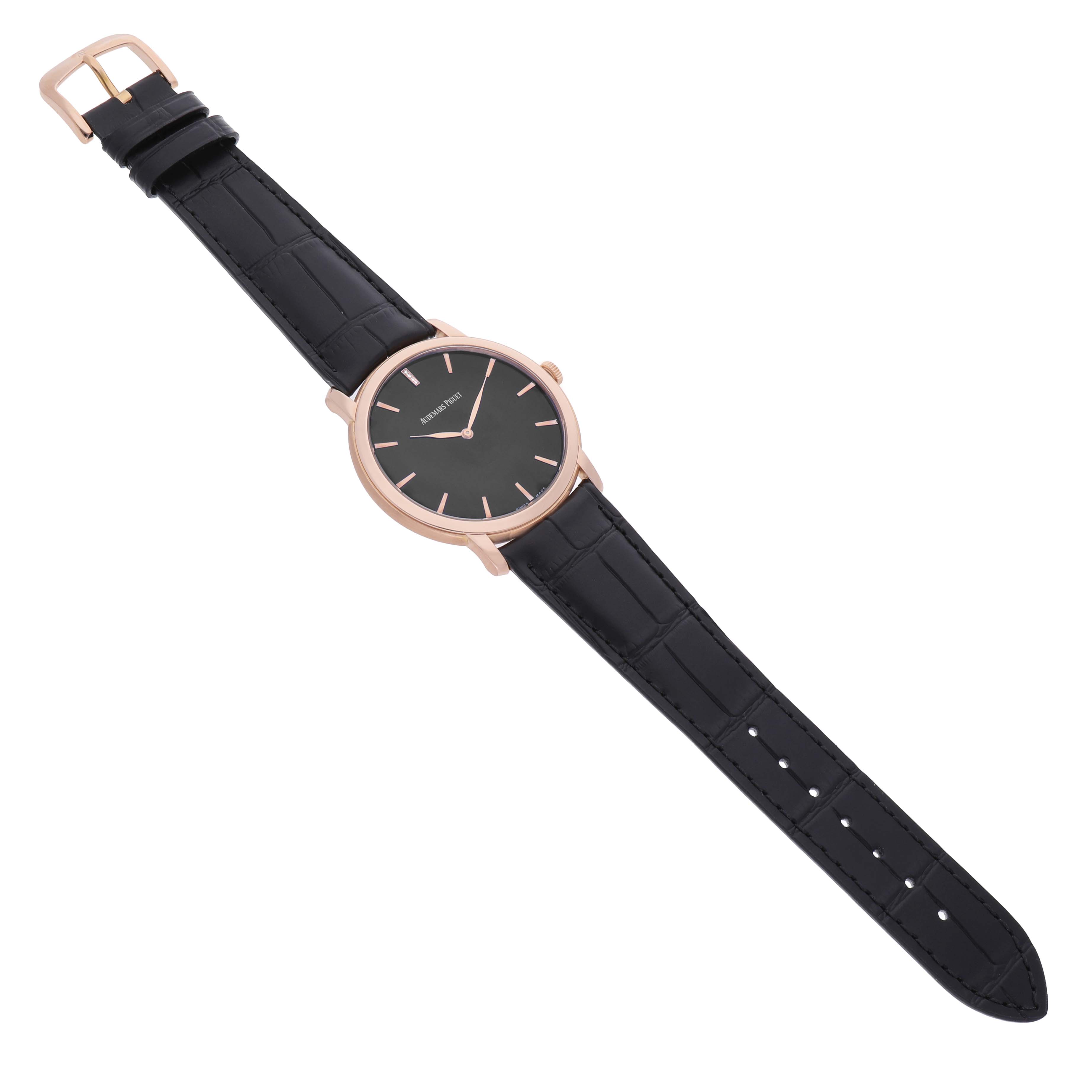 The Audemars Piguet Jules 15184OR.OO.A102CR.01 Men's Rose Gold Black Dial watch is shown from a top view, displaying the dial, case, and full leather strap.