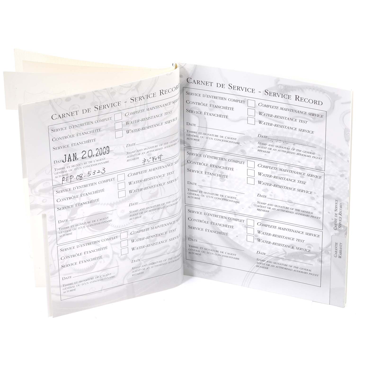 Shown is the service record booklet for a Royal Oak model by Audemars Piguet, opened to two pages.