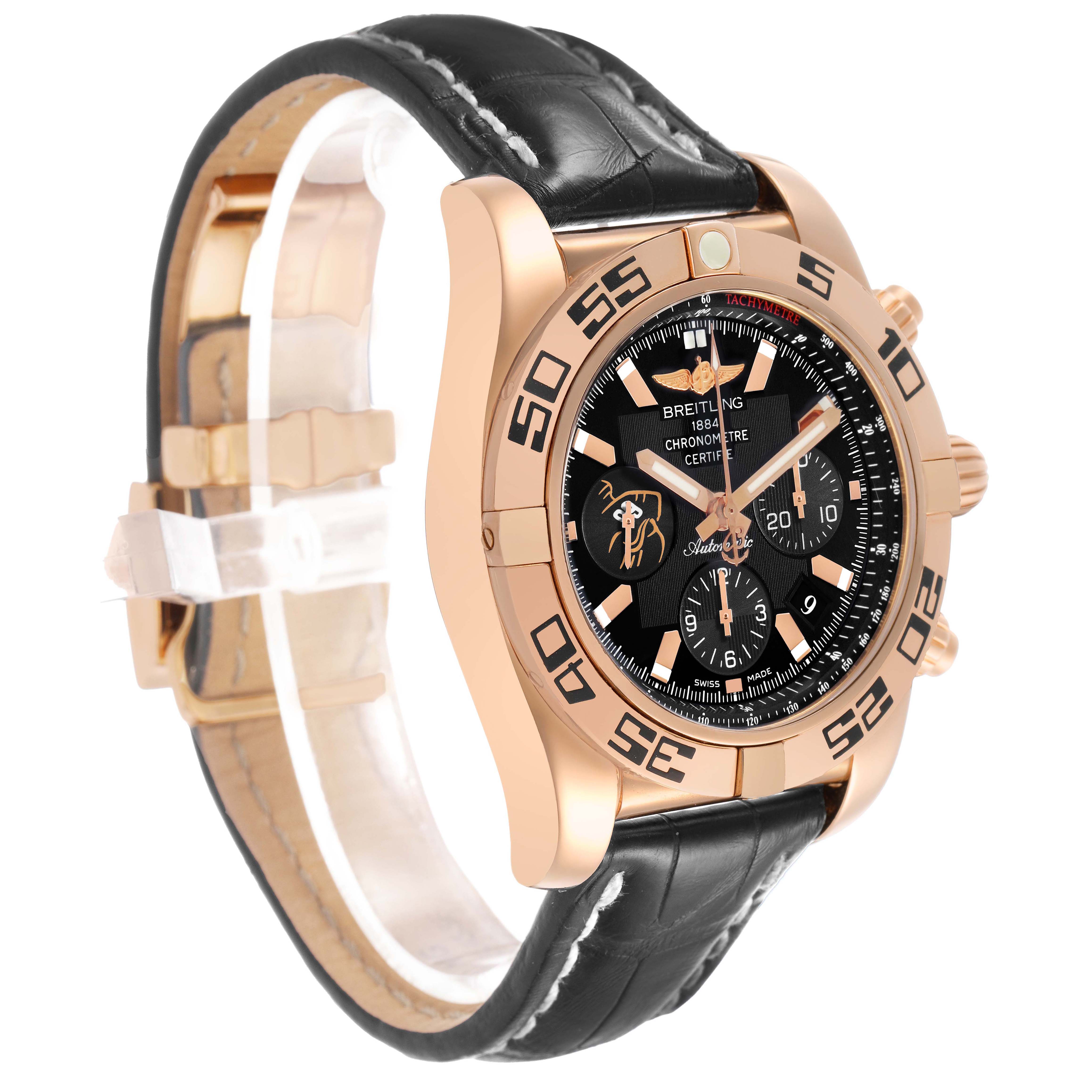 The Breitling Chronomat HB01115W/BE53 Men's Yellow Gold Black Dial watch is shown at a three-quarter angle, displaying the face, bezel, and leather strap.