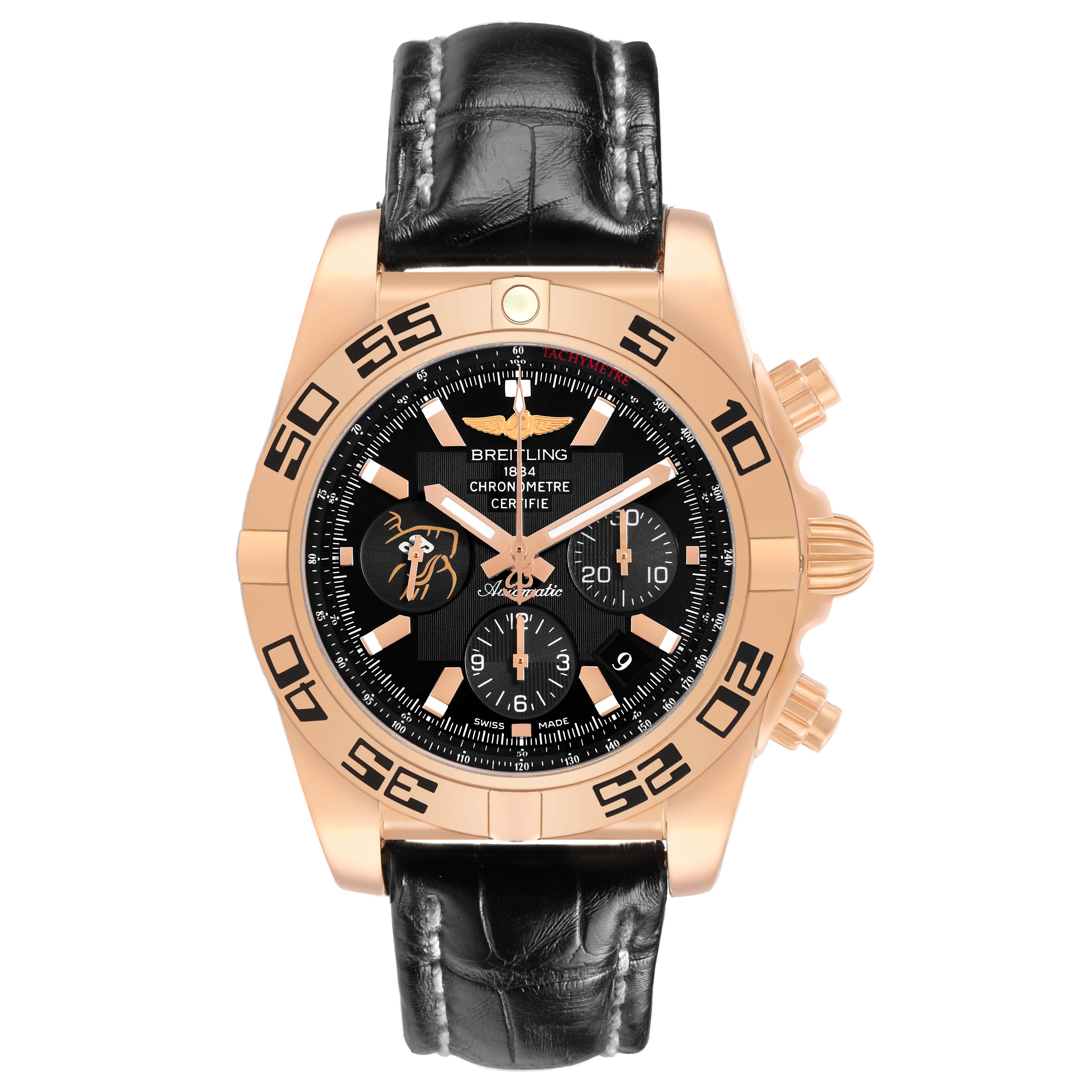 The Breitling Chronomat HB01115W/BE53 Men's Yellow Gold Black Dial watch is shown from a front angle, displaying the dial, bezel, crown, and pushers.
