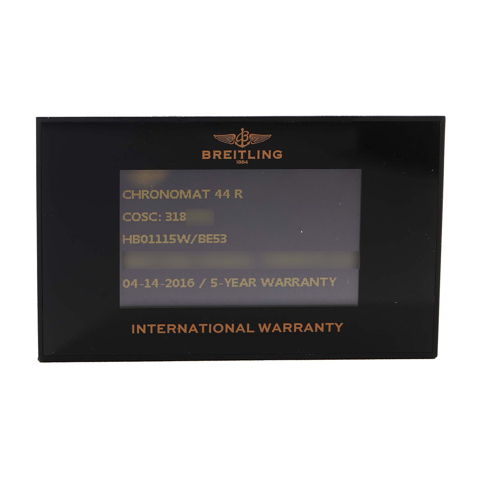 The image shows an international warranty card for the Breitling Chronomat HB01115W/BE53 Men's Yellow Gold Black Dial watch.