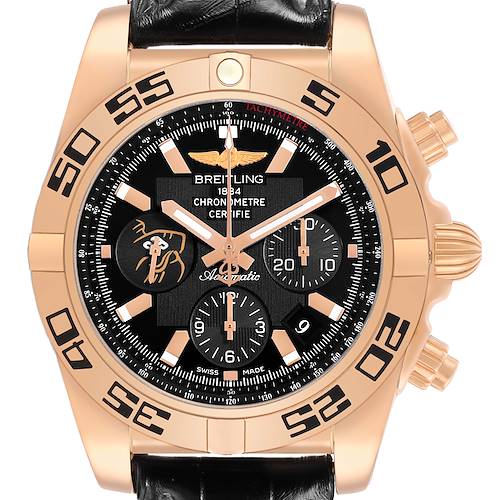The Breitling Chronomat HB01115W/BE53 Men's Yellow Gold Black Dial watch is shown front-facing, highlighting the dial, bezel, pushers, and crown.