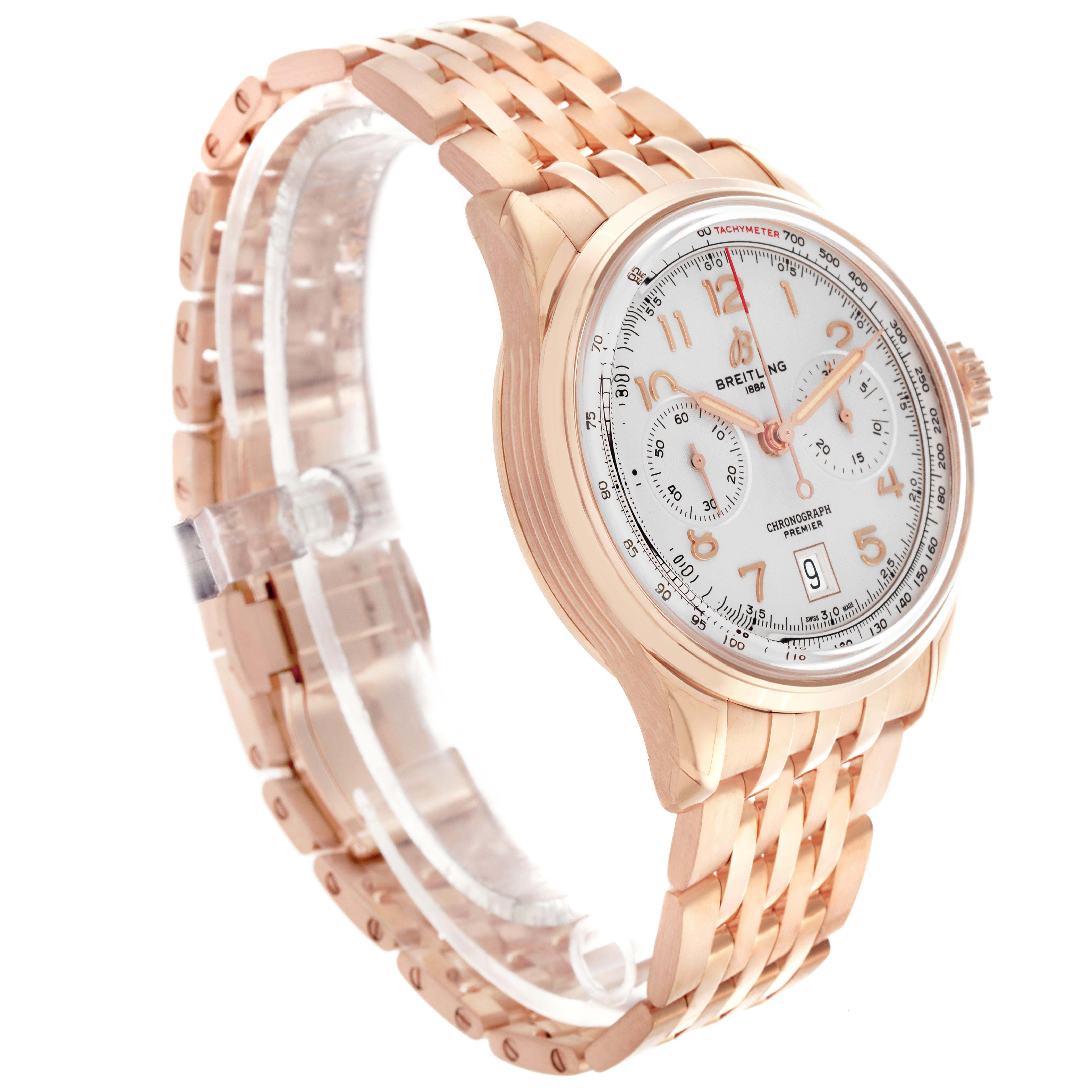 The Breitling Premier RB0145 Men
s Rose Gold White Dial watch is shown at a three-quarter angle, displaying its face, case, crown, and bracelet.