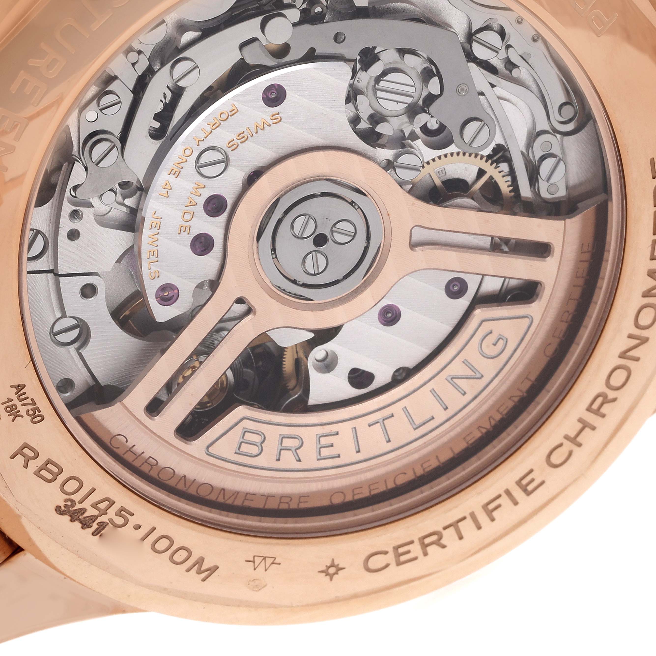 The image shows the movement and rotor of a Breitling Premier RB0145 Men
s Rose Gold White Dial model watch from the back view.