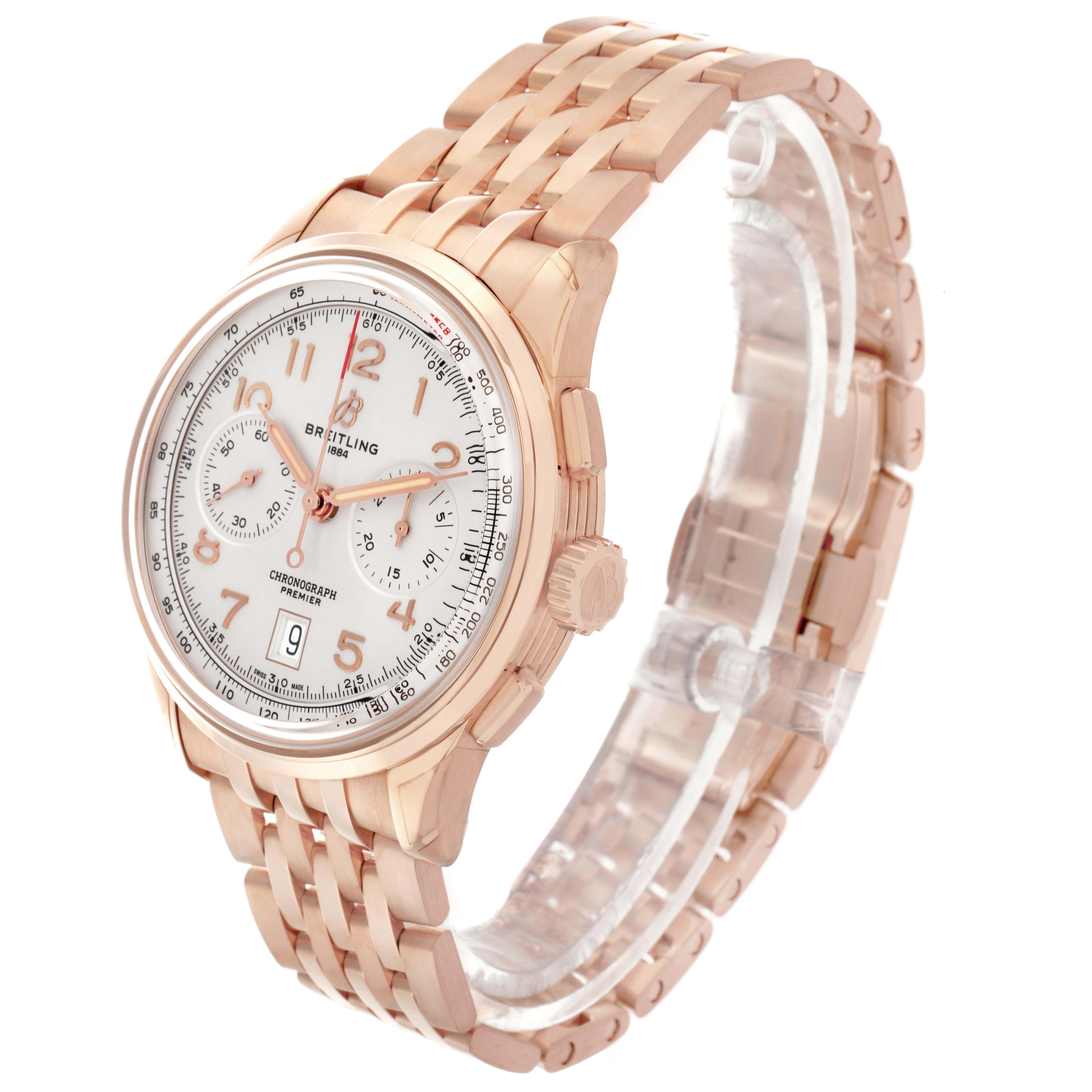 The Breitling Premier RB0145 Men
s Rose Gold White Dial watch is shown at a side angle, displaying the dial, crown, and bracelet.