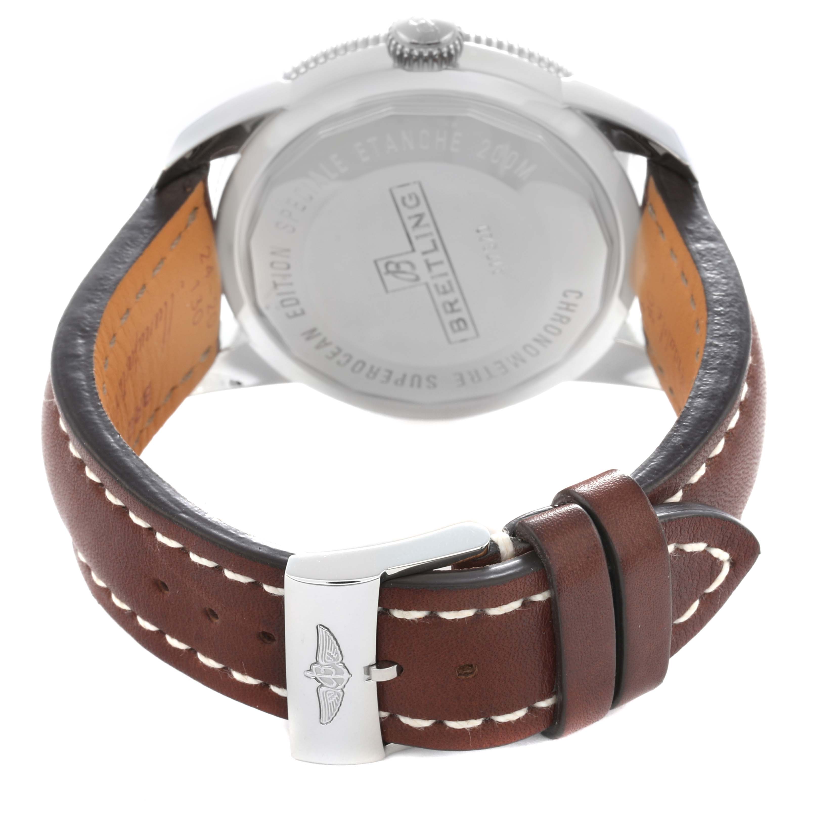 The image shows the back of a Breitling Superocean A17320 Men
s Stainless Steel Brown Dial watch, featuring its case back, leather strap, and buckle.