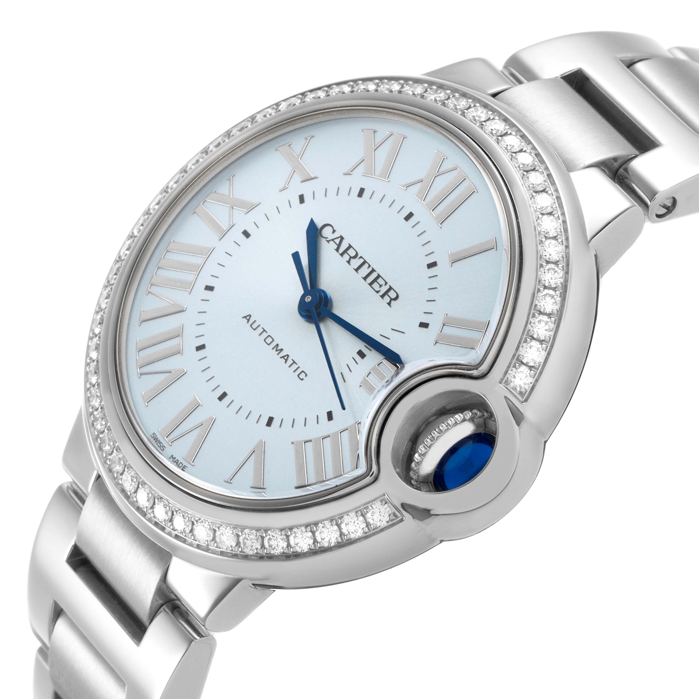The Cartier Ballon Bleu W4BB0028 Women's Stainless Steel Blue Dial watch is shown at an angled view, highlighting the diamond bezel, stainless steel case, and sapphire crown.