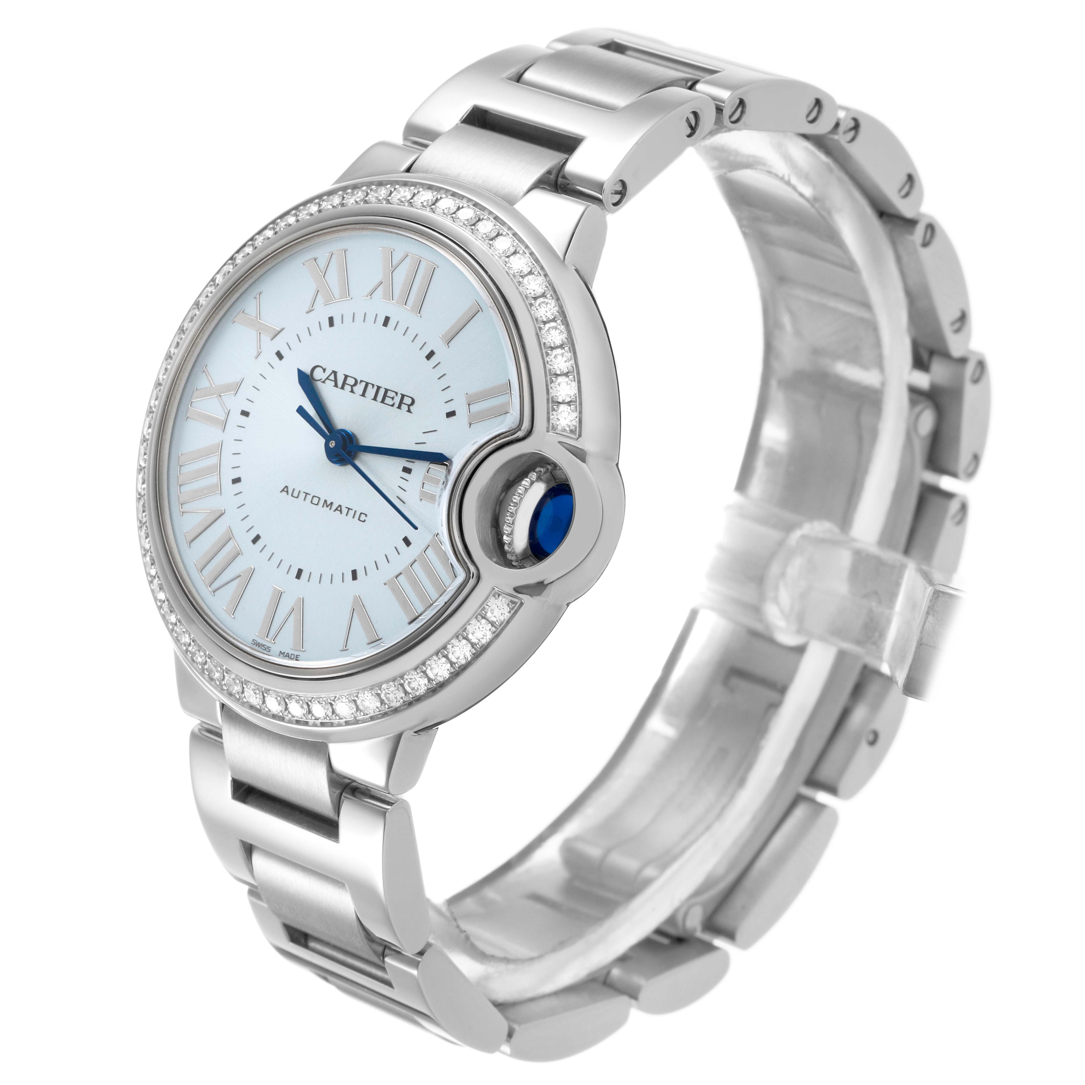 The Cartier Ballon Bleu W4BB0028 Women's Stainless Steel Blue Dial watch is shown at a three-quarter angle, displaying the dial, bracelet, and crown.