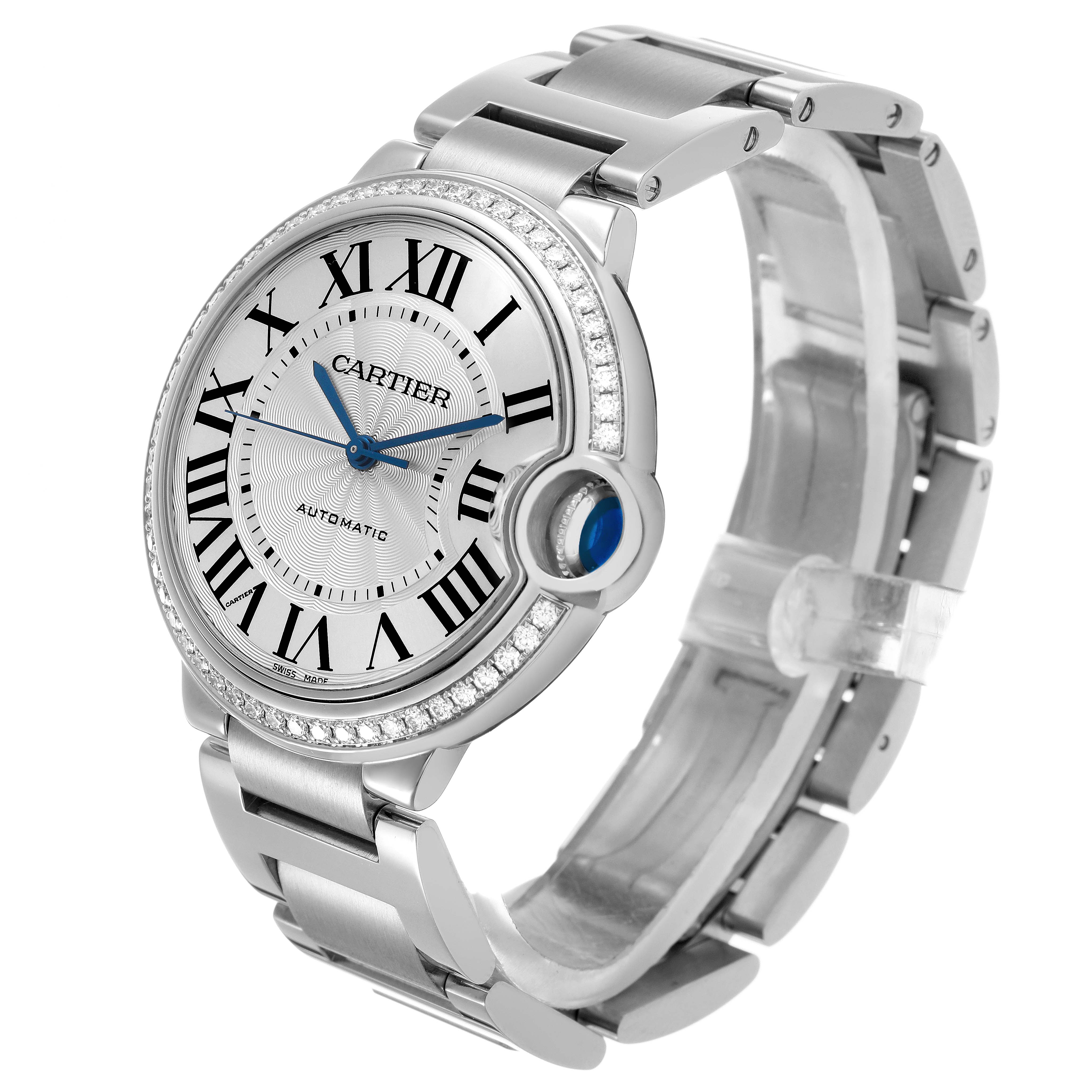 The Cartier Ballon Bleu W4BB0017 Men's Stainless Steel Silver Dial watch is shown from a front-left angle, highlighting its round face, Roman numerals, and metal bracelet.