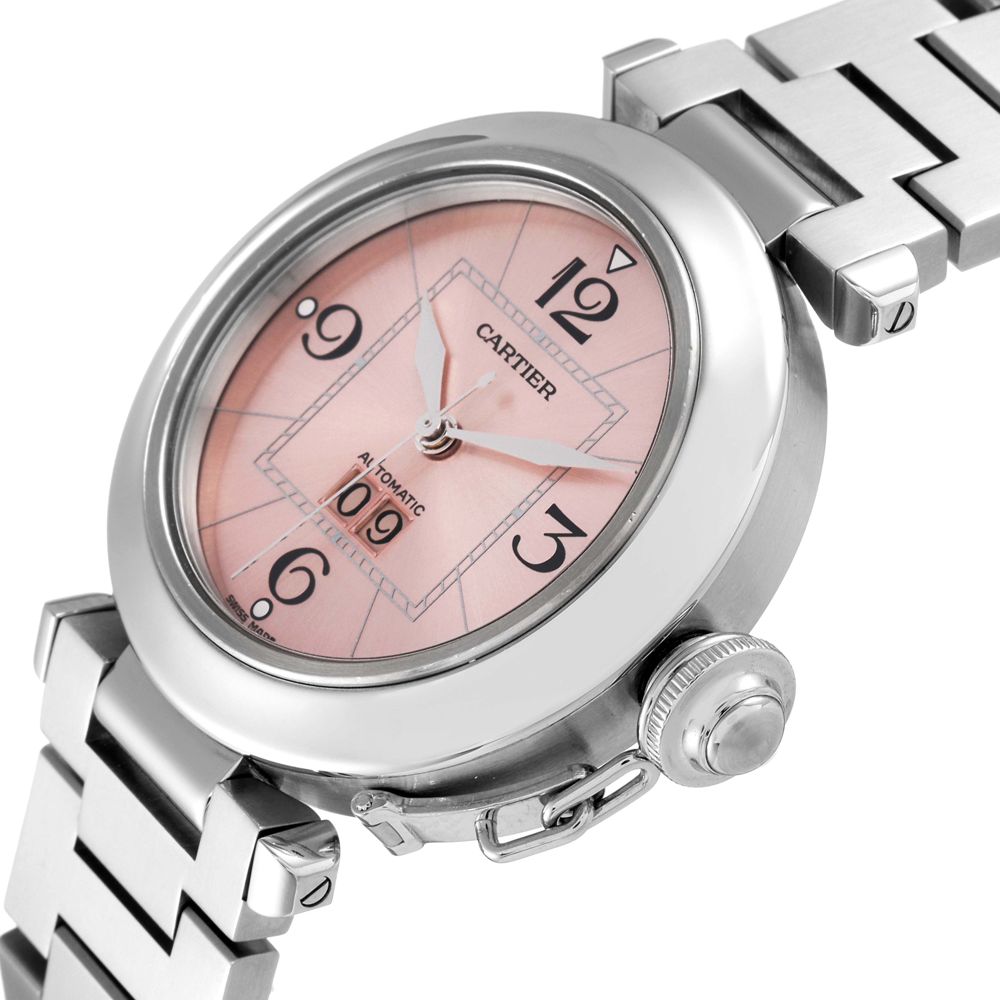 The image shows a Cartier Pasha W31058M7 Women's Stainless Steel Pink Dial W31058M7 Women's Stainless Steel Pink Dial watch taken from an angled close-up, displaying the dial, case, crown, and part of the bracelet.