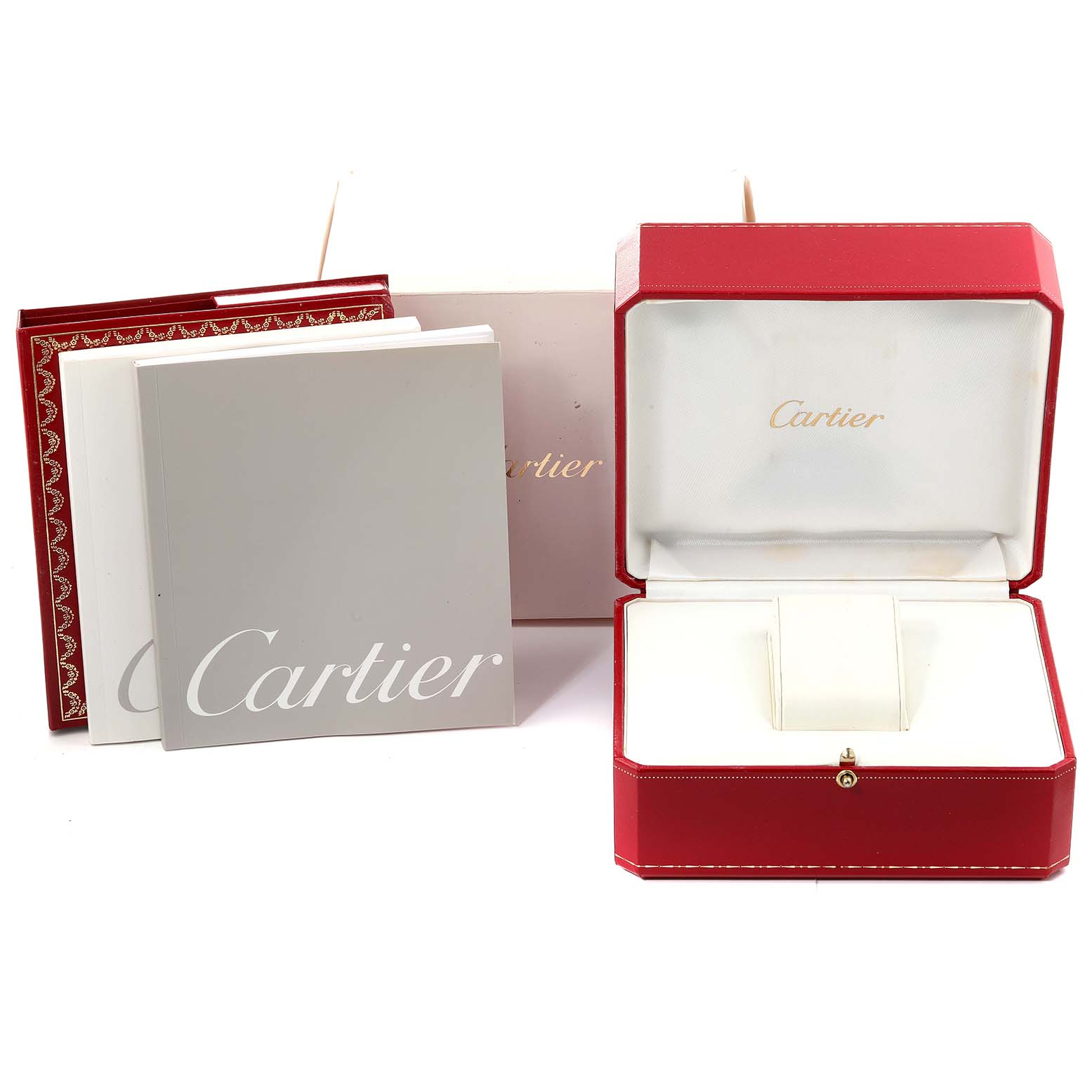 The image shows the Cartier Pasha W31058M7 Women's Stainless Steel Pink Dial W31058M7 Women's Stainless Steel Pink Dial watch box, with associated booklets, packaging, and an open red jewelry box.